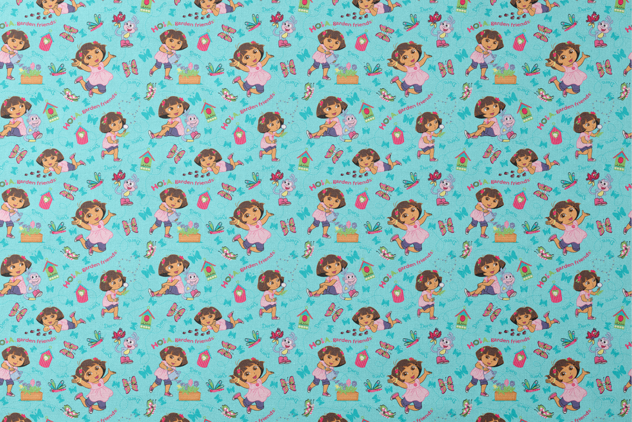 Colorful Dora the Explorer pattern on light blue background designs flat mockup