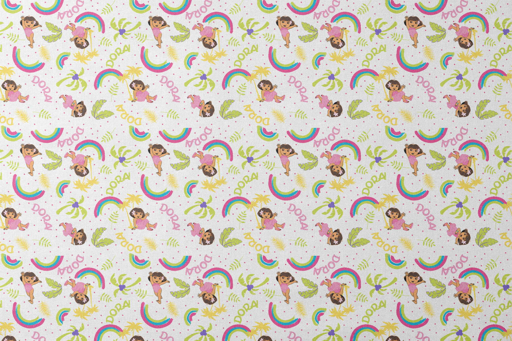 Cartoon pattern with colorful rainbows, Dora the Explorer characters, green leaves, and yellow leaves on white background designs flat mockup