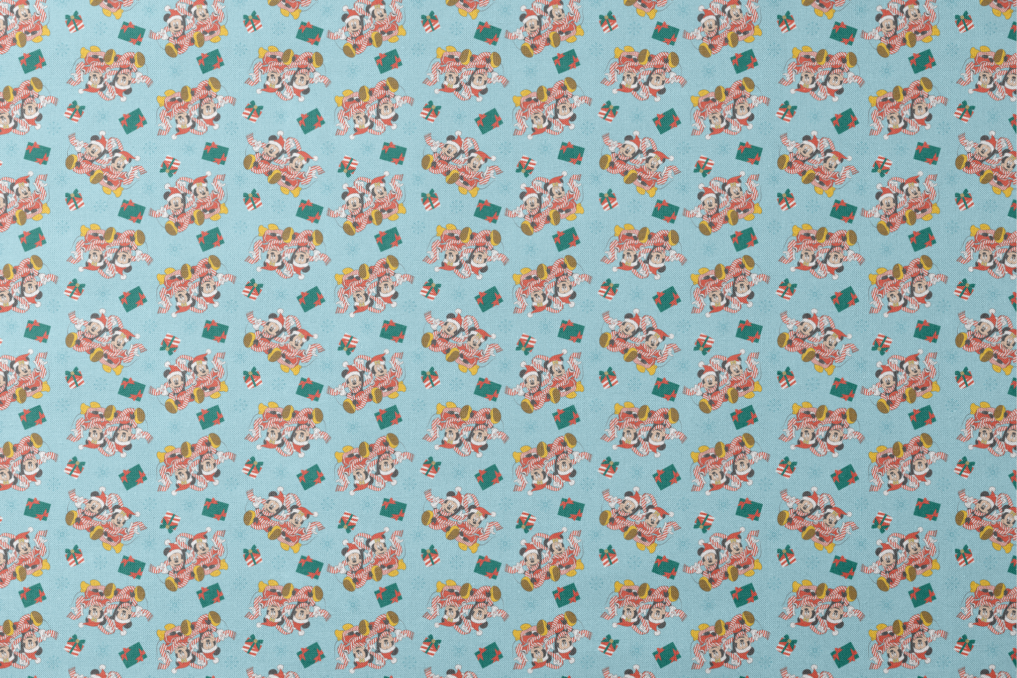 Mickey and Minnie Mouse pattern with candy stripe pajamas, presents, and snowflakes on light blue background designs flat mockup
