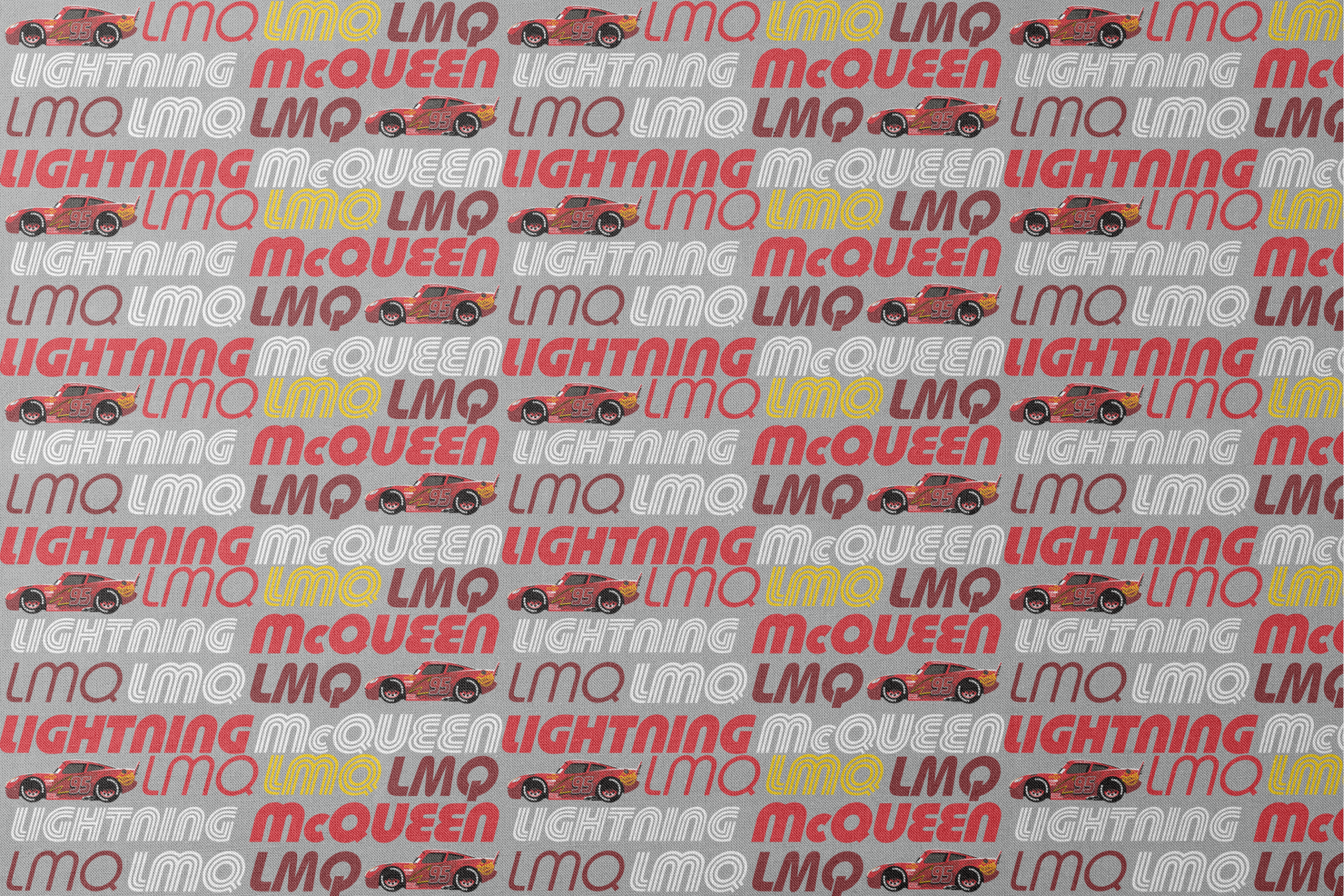 Lightning McQueen race car graphic with repeating LMQ text in red, yellow, and white on gray background designs flat mockup