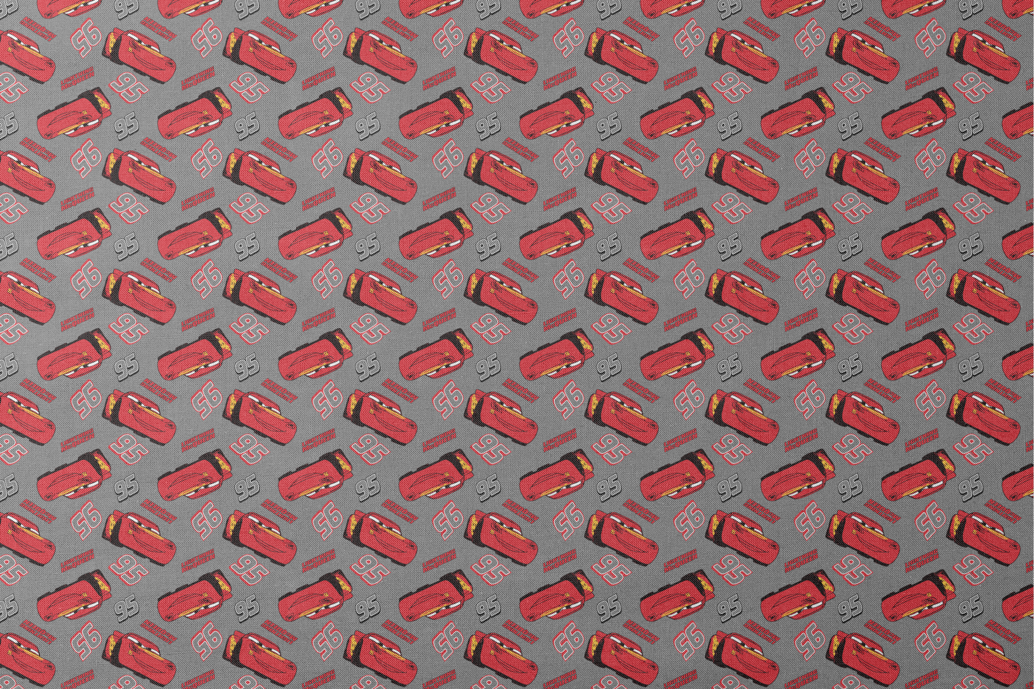 Lightning McQueen pattern with red race cars and number 95 on gray background designs flat mockup