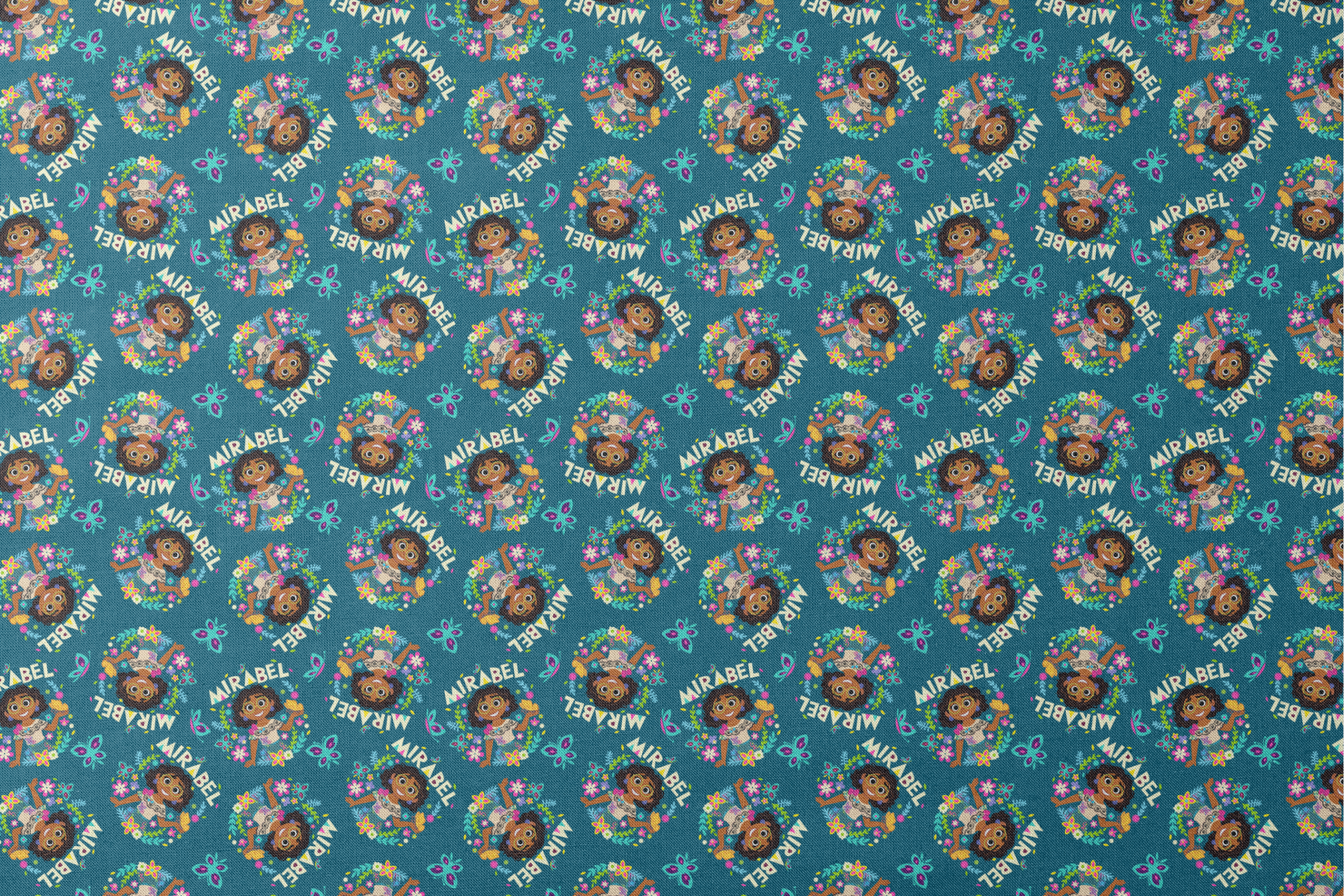 Colorful cartoon pattern on teal background featuring characters, butterflies, flowers, and "Mirabel" text in repeating design designs flat mockup