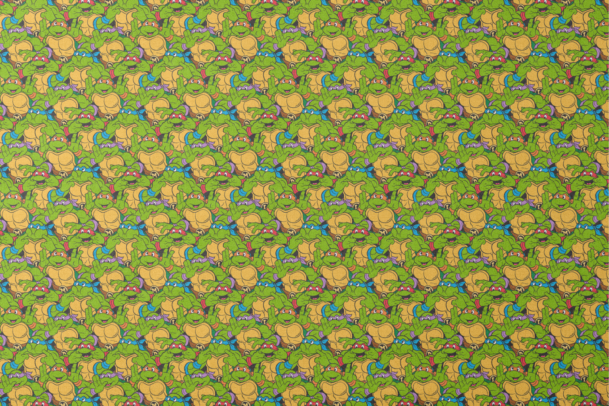 Colorful pattern of cartoon Teenage Mutant Ninja Turtles with green skin and yellow shells designs flat mockup