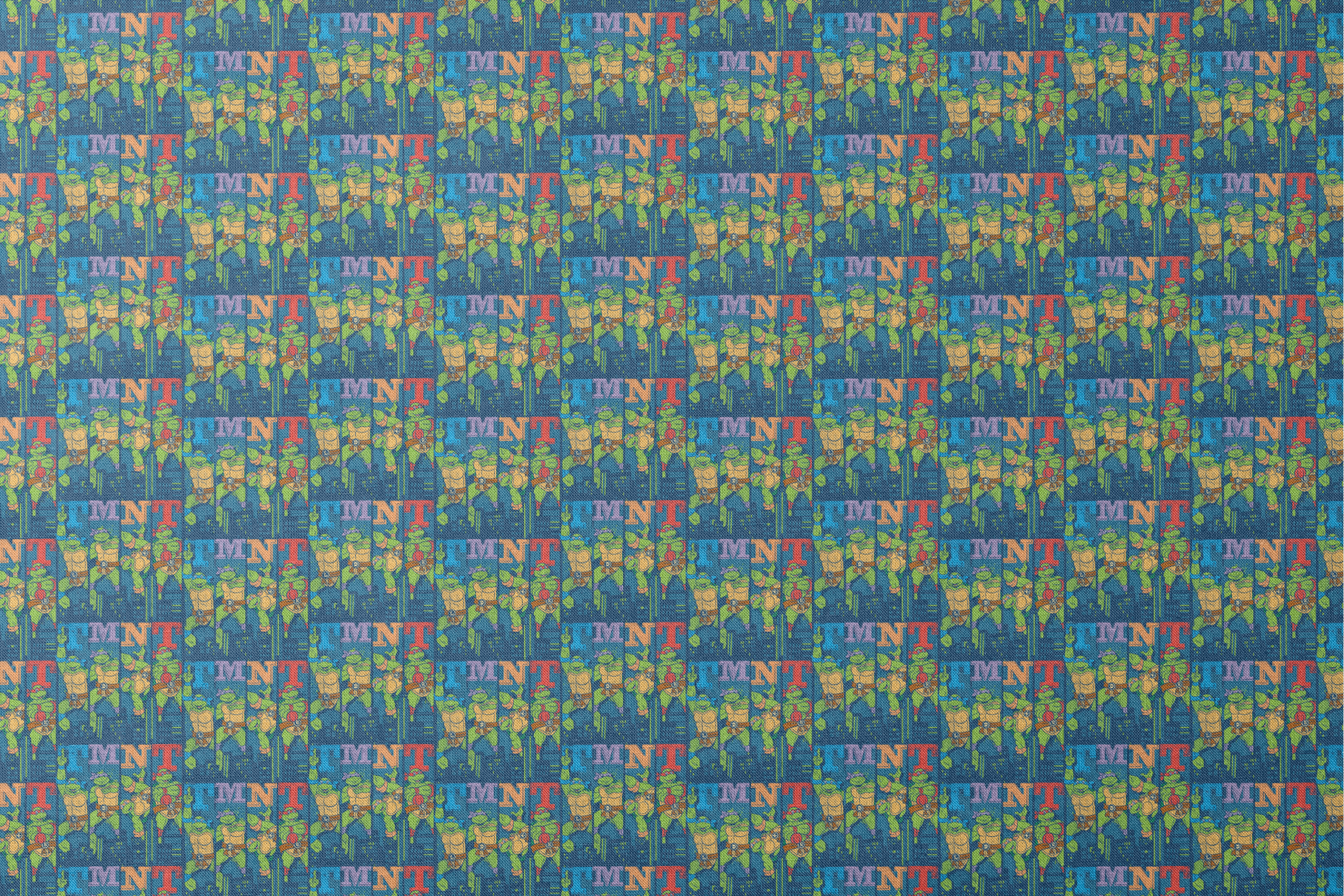 Colorful Teenage Mutant Ninja Turtles cartoon pattern with characters and "TMNT" text on blue cityscape background designs flat mockup