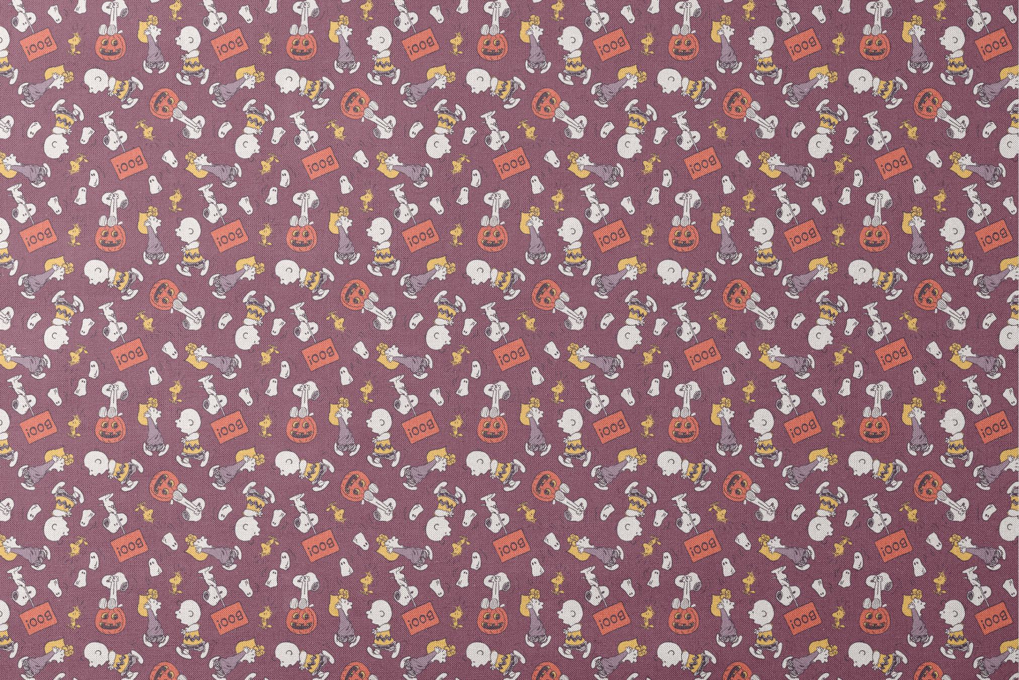 Snoopy and Woodstock Halloween pattern on purple background with pumpkins, ghosts, and "boo!" text designs flat mockup