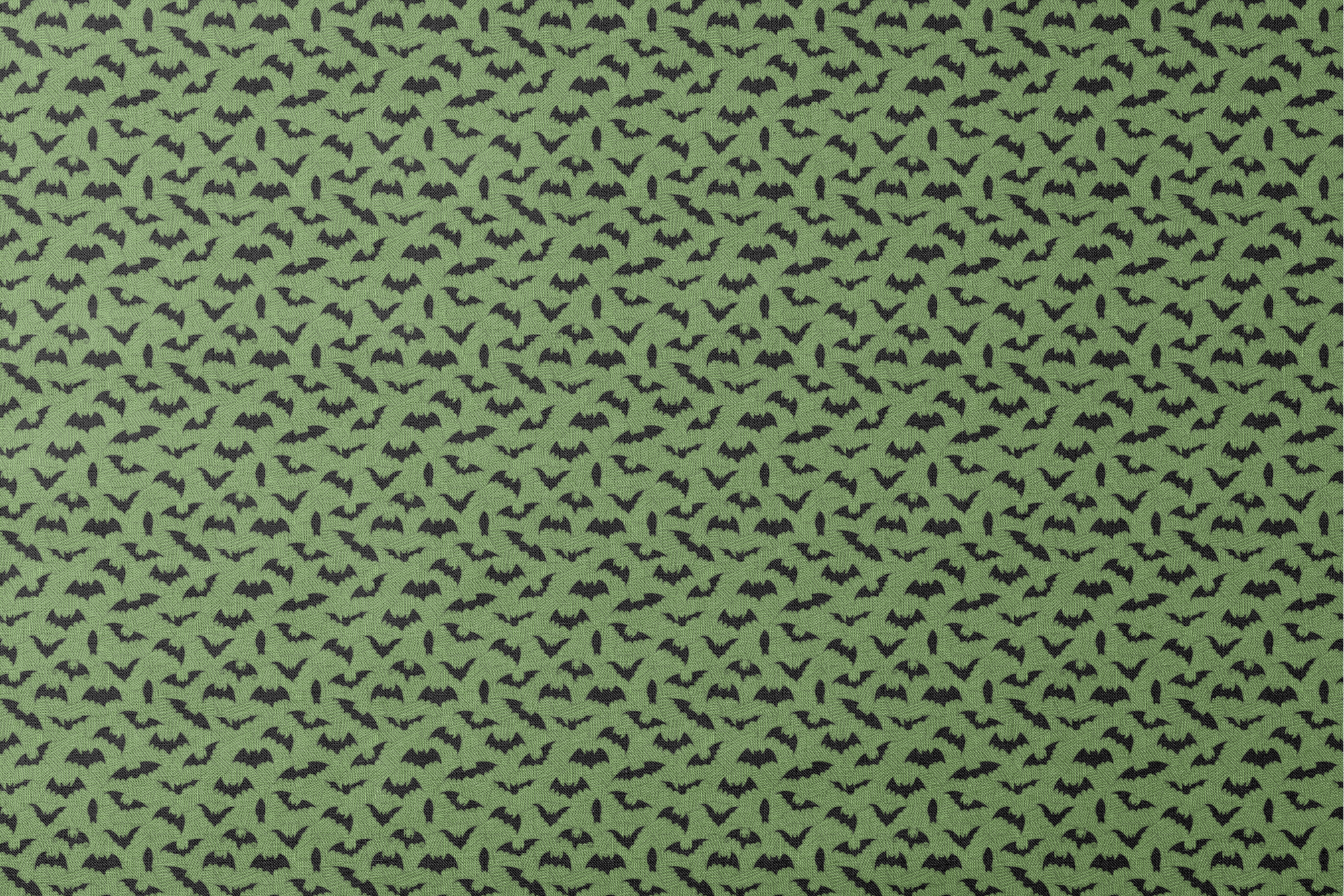 Black bat silhouettes scattered across a green textured background with zigzag pattern designs flat mockup
