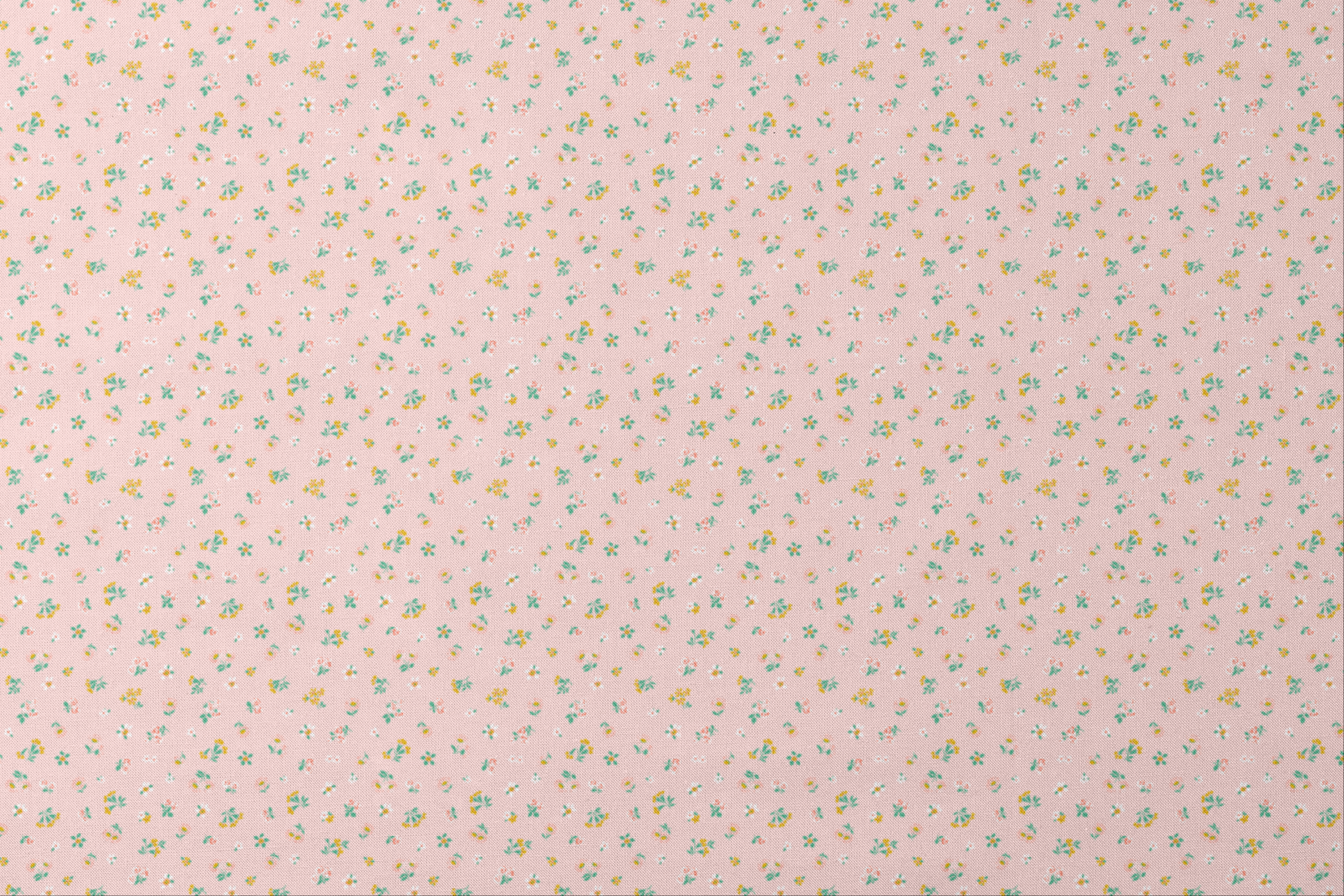 Small floral pattern on pink background with white daisies and yellow, blue, and pink flowers designs flat mockup