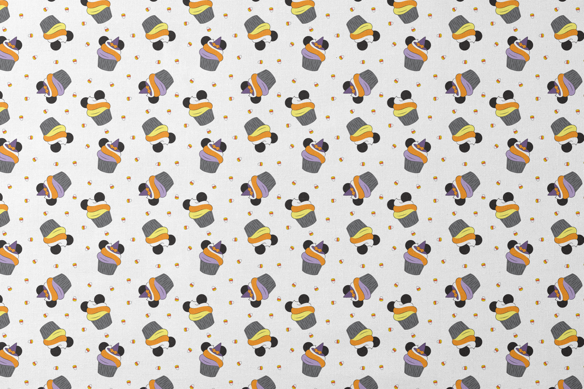 Disney cupcakes with black circular elements and colorful frosting in orange, yellow, and purple on a white background. designs flat mockup