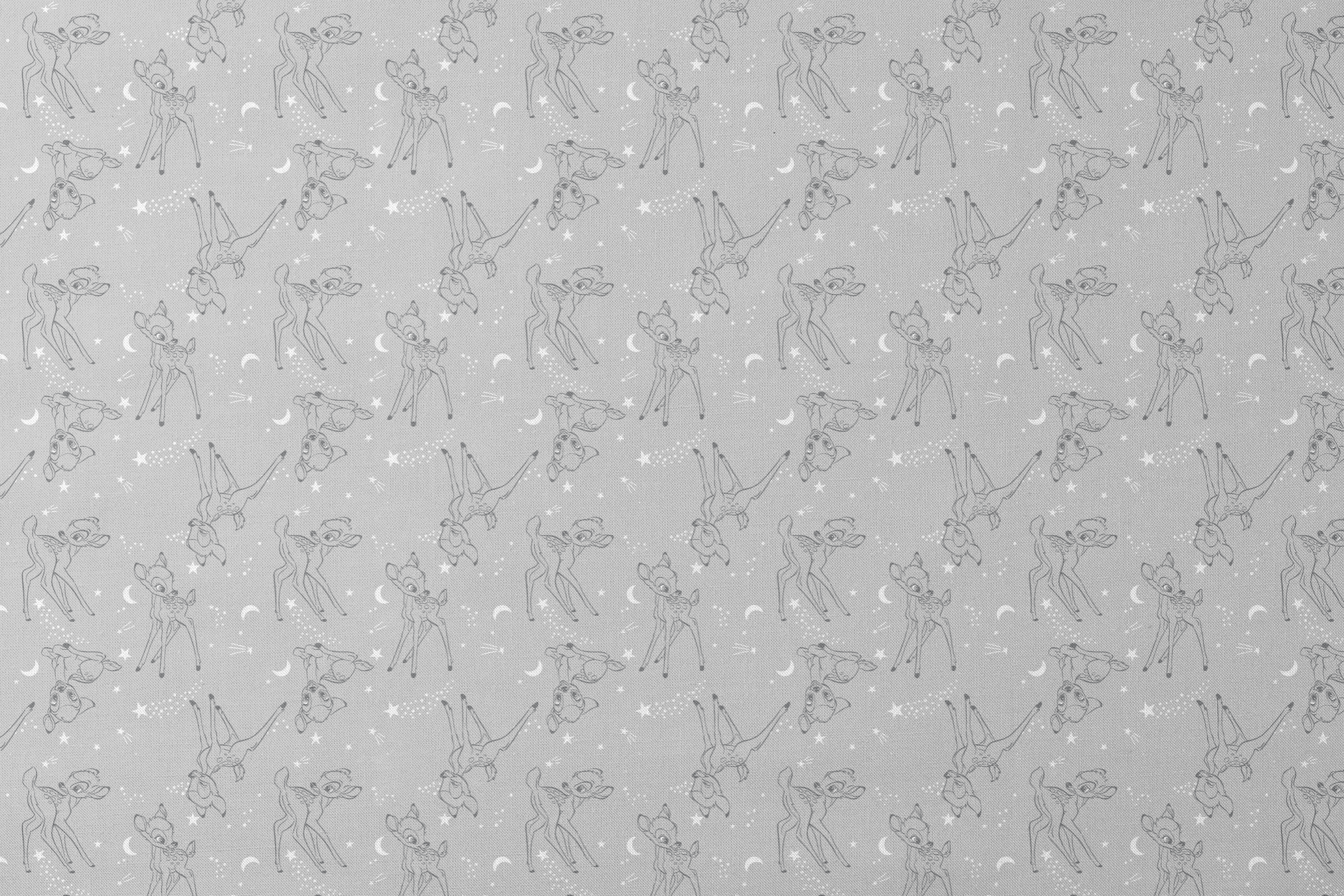 Line art illustrations of Disney’s Bambi surrounded by stars, moons, and stardust trails on a soft gray background in a scattered repeat. designs flat mockup