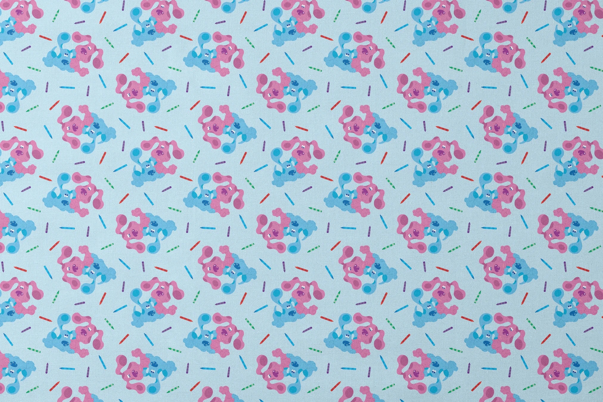Playful pattern of cartoon blue and pink dogs with colorful stick accents on light blue background designs flat mockup