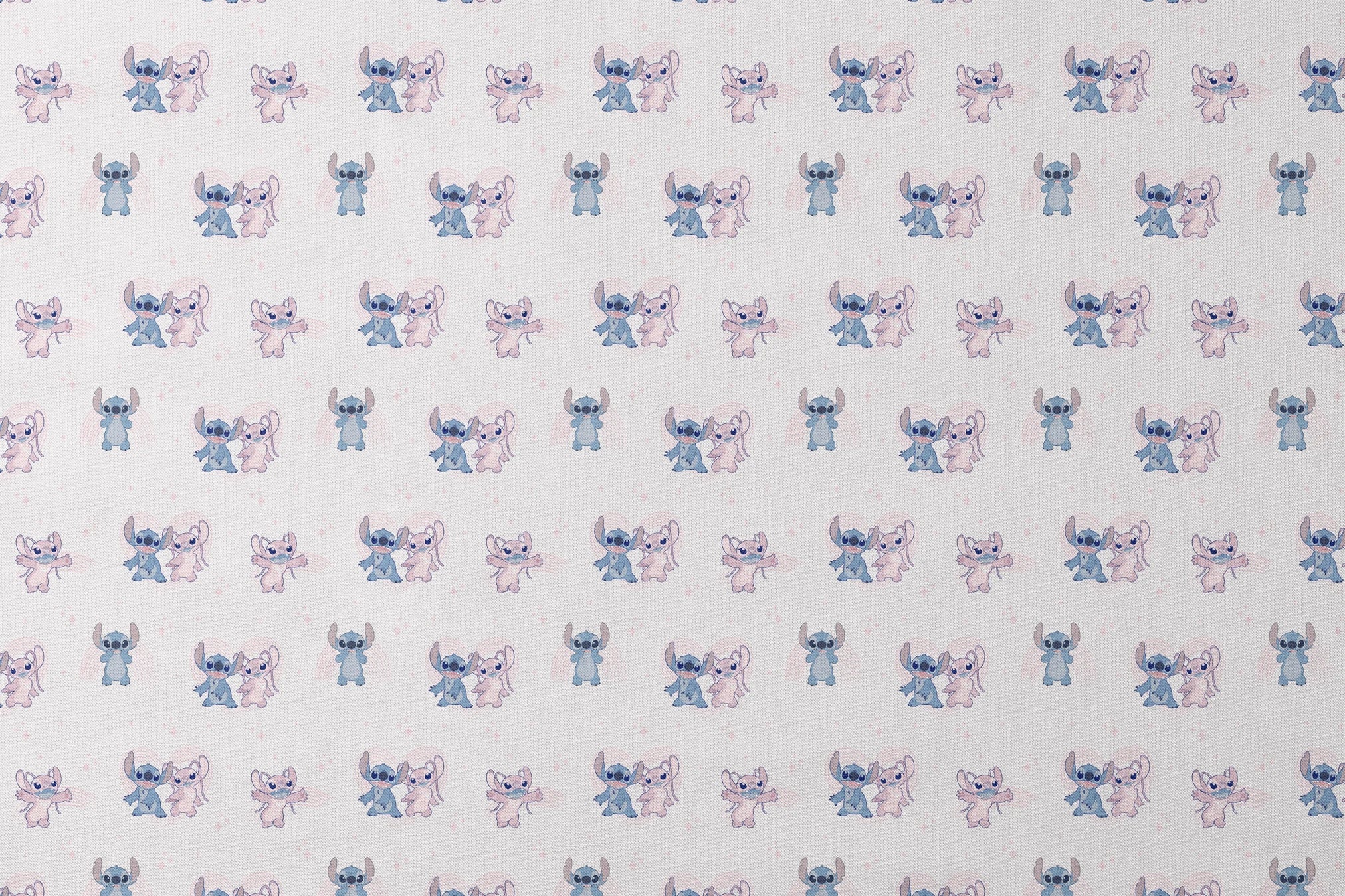 Cartoon pattern of blue and pink Stitch characters from Lilo & Stitch with playful poses on pale background designs flat mockup