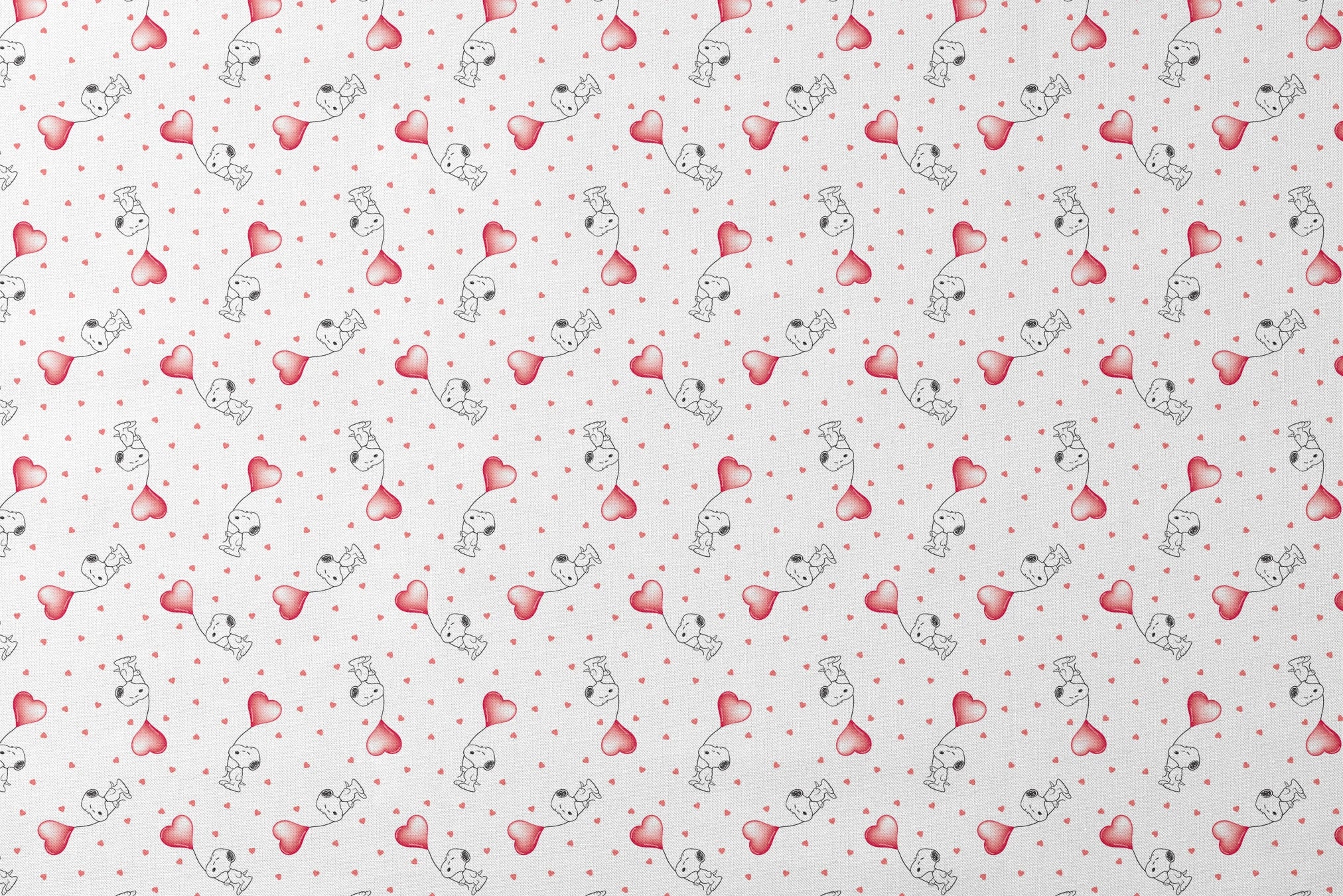 Cute Snoopy holding heart-shaped balloons with small hearts scattered on white background designs flat mockup