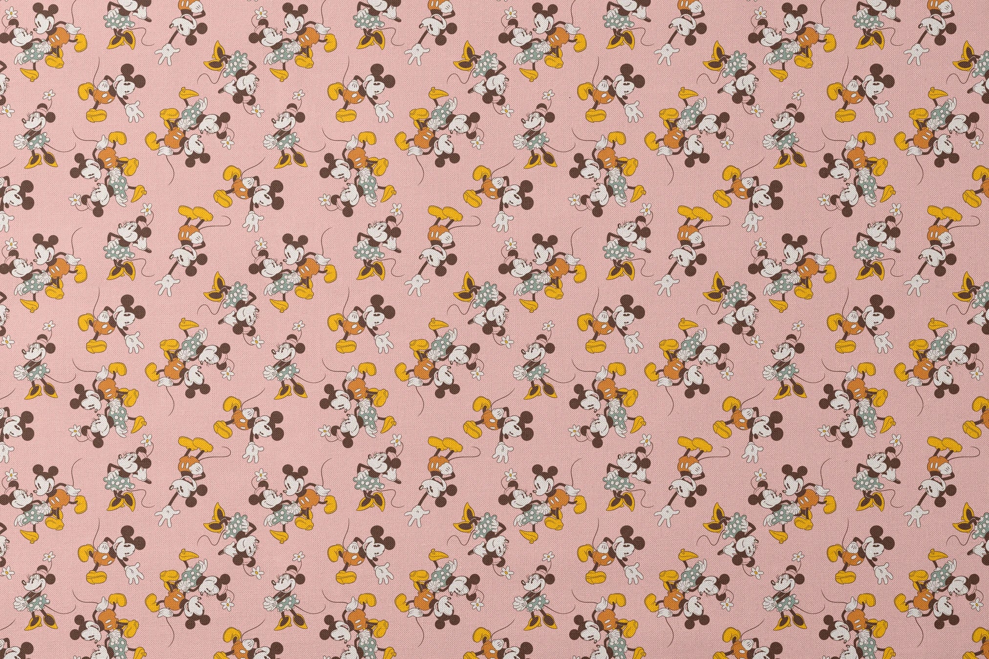 Mickey and Minnie Mouse characters in vintage style on pink background with repeated pattern designs flat mockup