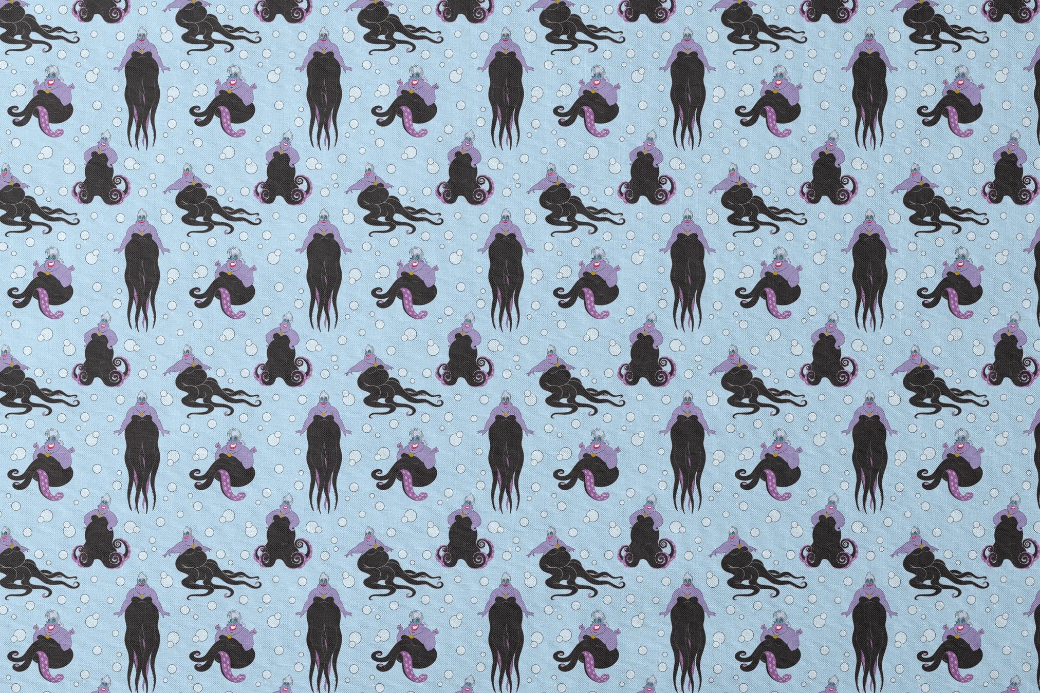 Ursula with black tentacles swimming in a light blue underwater scene with white bubbles designs flat mockup
