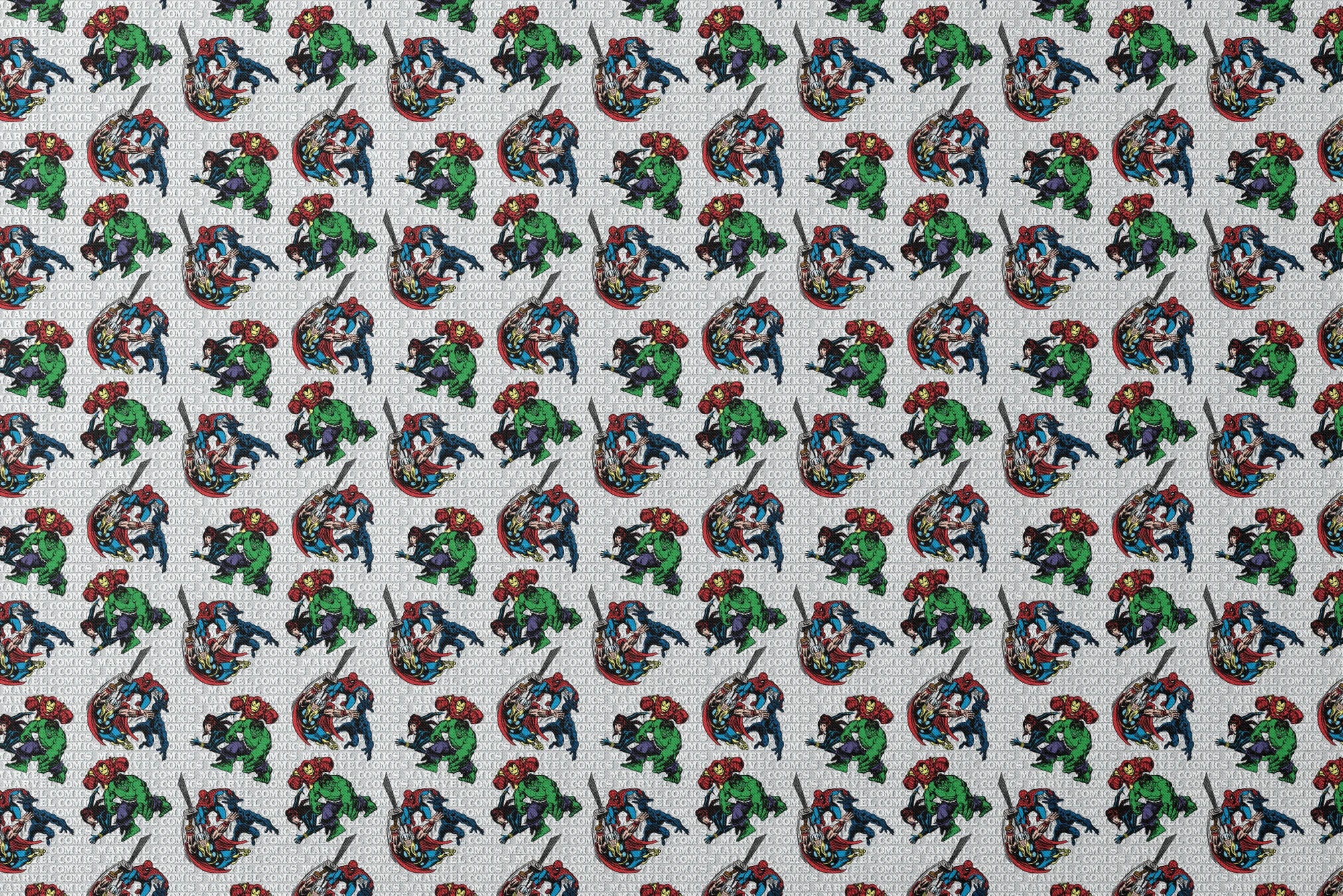 Marvel Comics superheroes pattern with Hulk, Iron Man, Captain America, and Spider-Man on a repeating text background. designs flat mockup