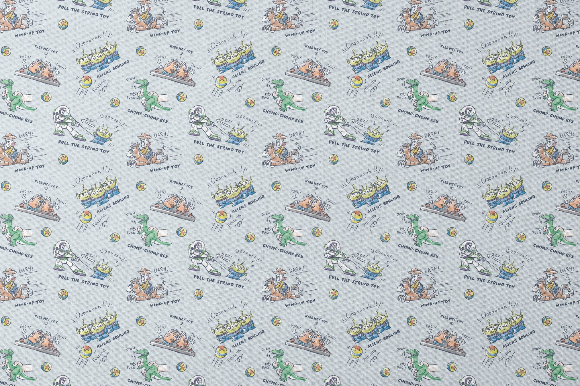 Illustrated Toy Story character designs showing wind-up, pull string, and action toys on light blue background designs flat mockup