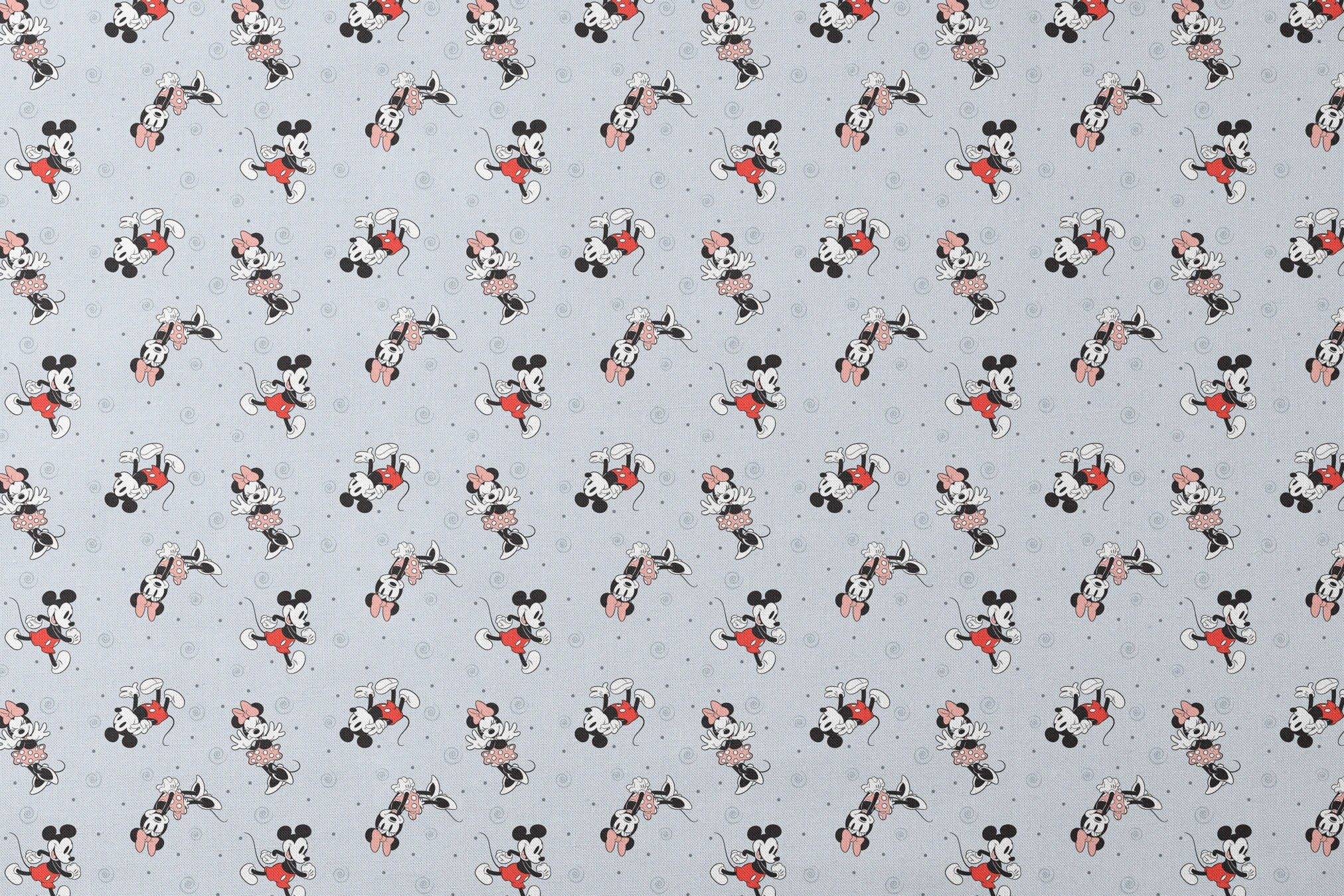 Classic Minnie and Mickey Mouse pattern with characters in various poses on light blue background with swirls designs flat mockup