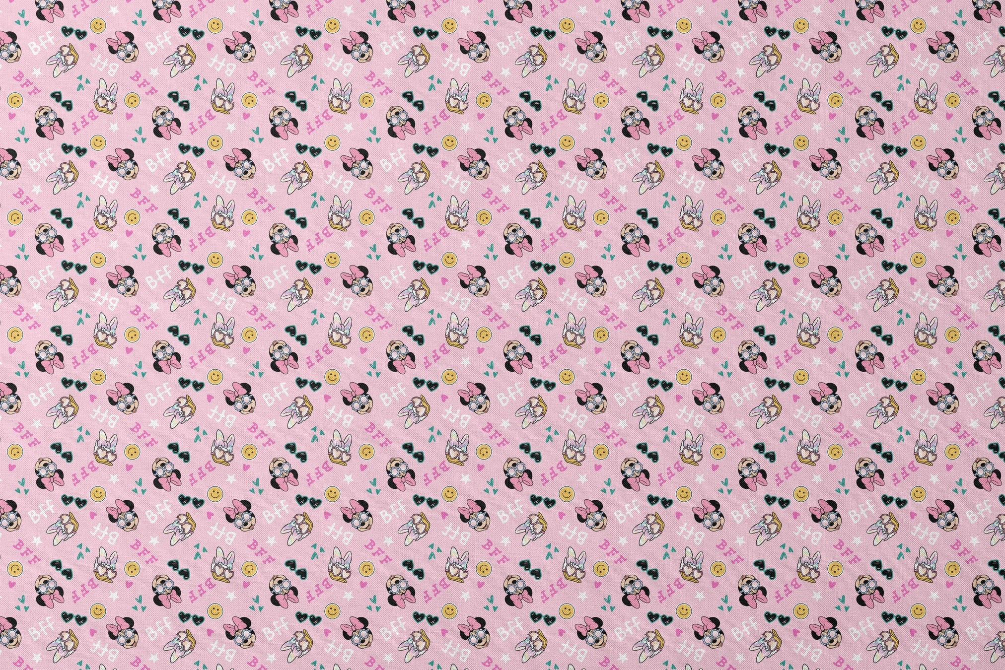 Pink background with Minnie Mouse pattern featuring bows, heart sunglasses, smiley faces, and "BFF" text in playful colors. designs flat mockup
