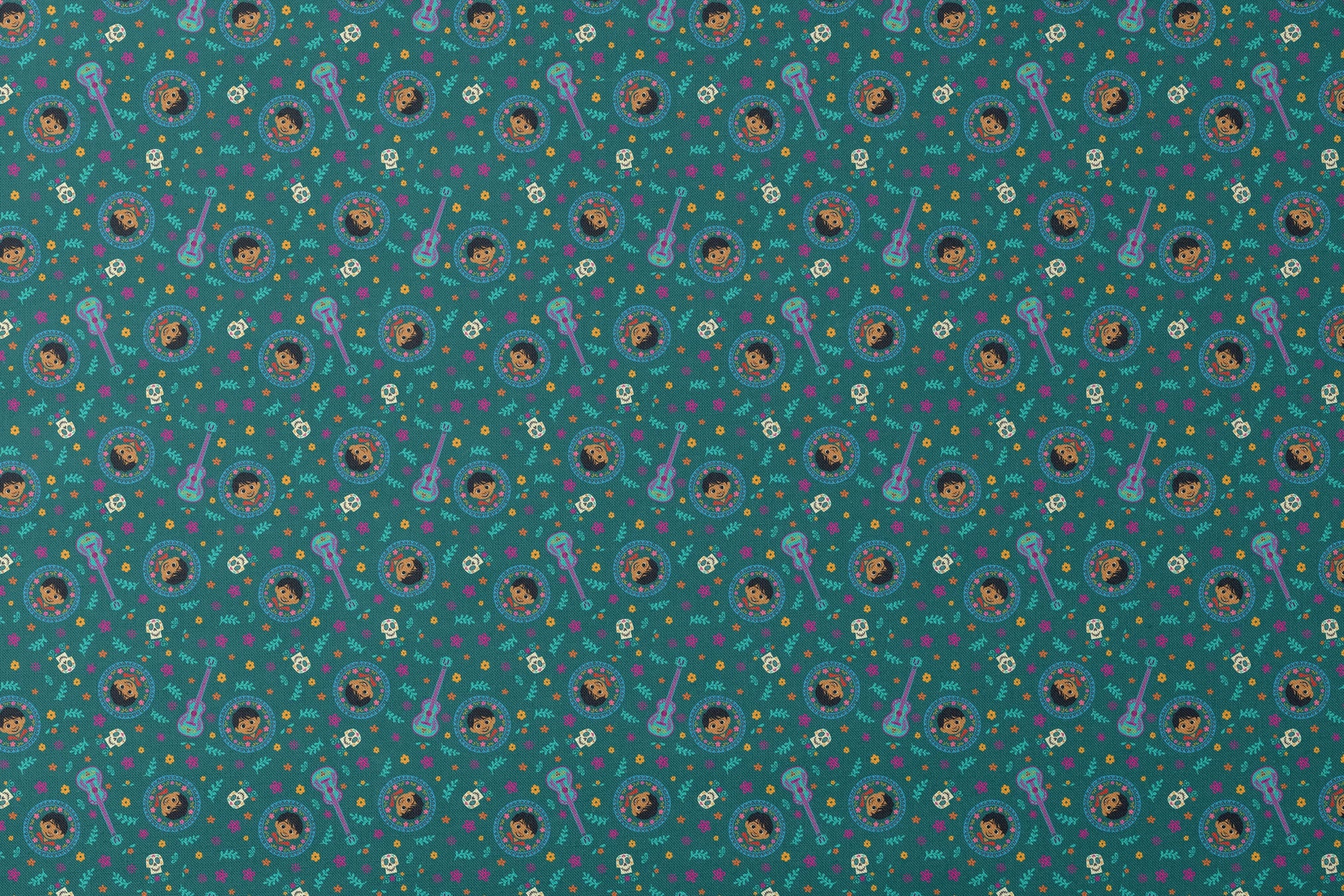 Colorful Coco-inspired pattern with guitars, sugar skulls, circular portraits, and floral elements on teal background. designs flat mockup