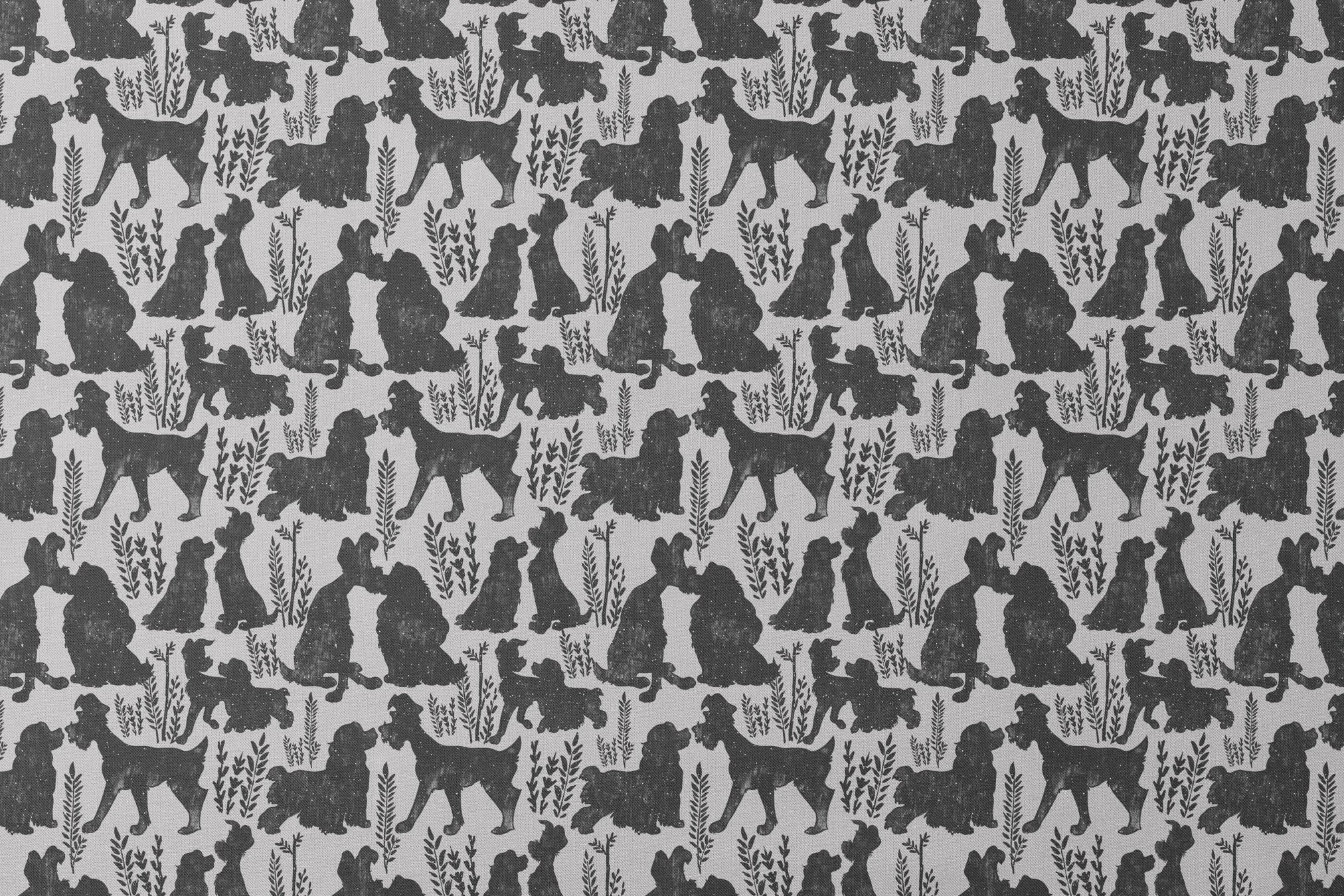 Repeating pattern of black dog silhouettes with decorative plant motifs on a light gray background designs flat mockup