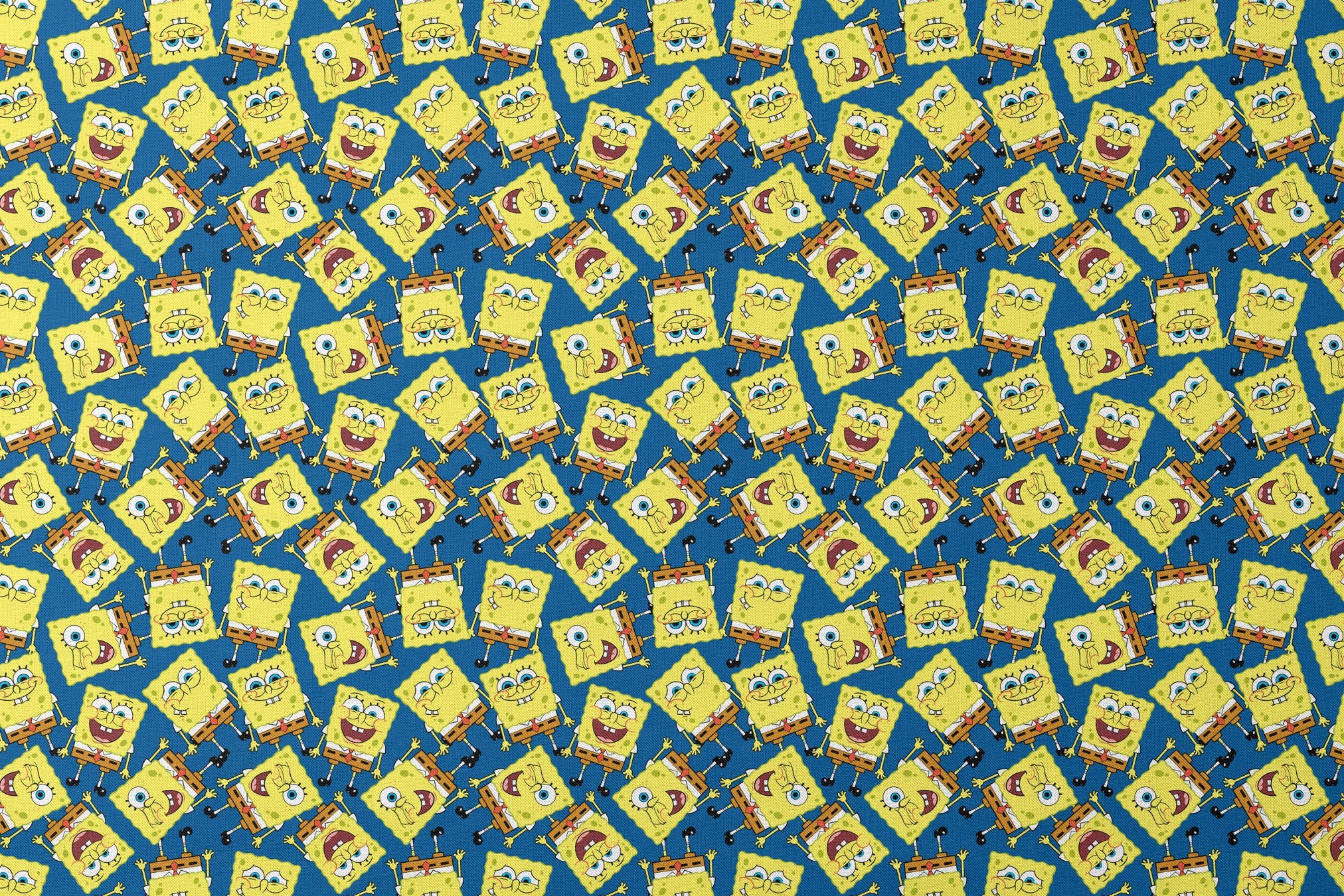 SpongeBob SquarePants pattern featuring various expressions on blue background designs flat mockup