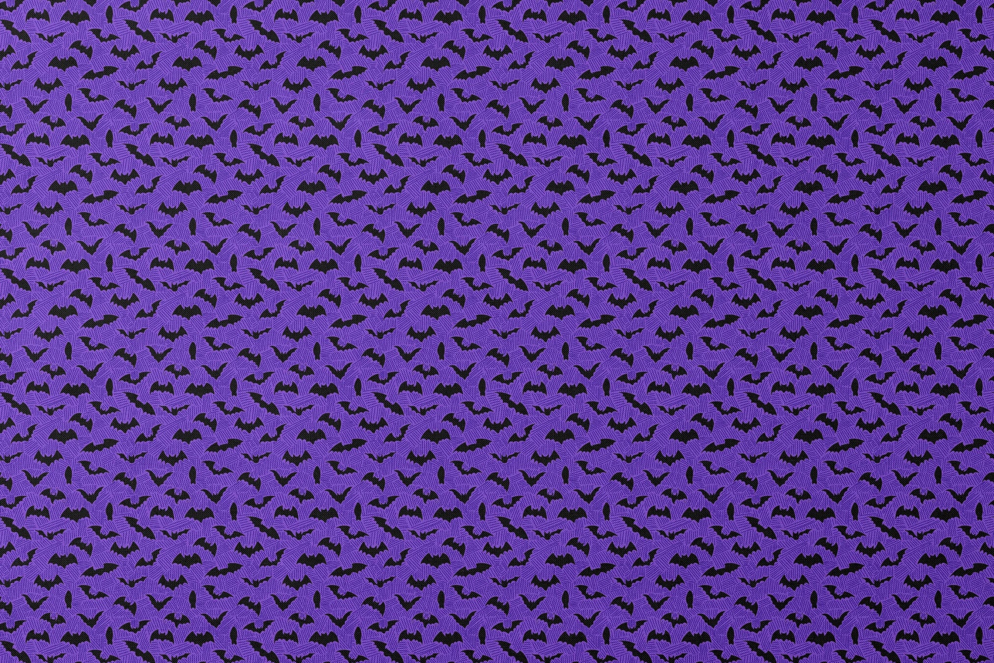 Black bat silhouettes scattered over purple zigzag background, Halloween-themed pattern designs flat mockup