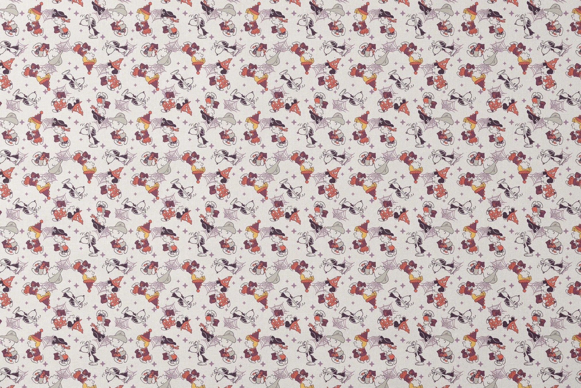 Peanuts characters in Halloween costumes including Snoopy, Charlie Brown, and friends on white background designs flat mockup