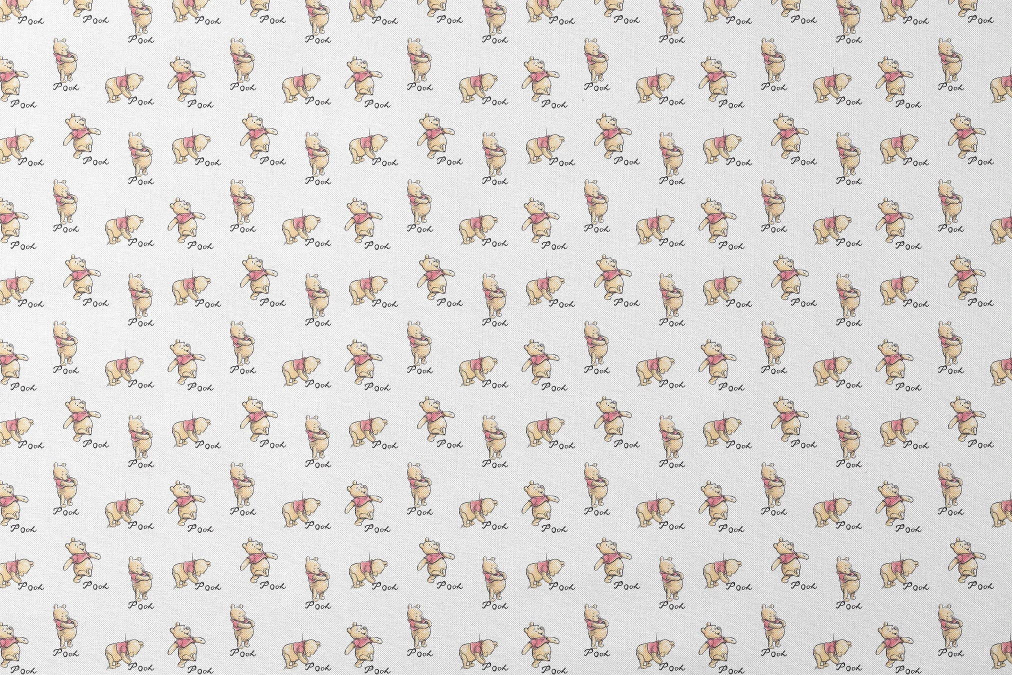 Winnie the Pooh pattern featuring cute yellow bears with red shirts in various poses, labeled "Pooh designs flat mockup