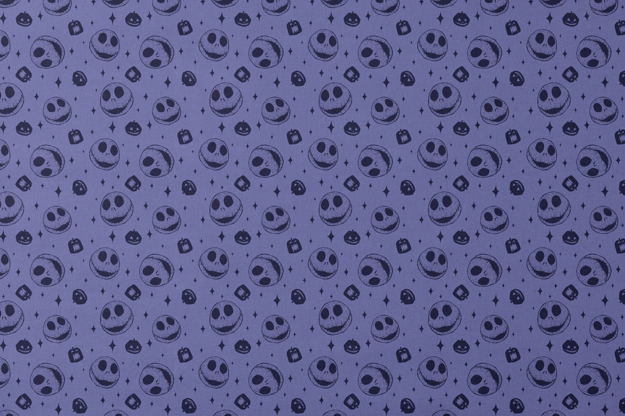 Nightmare Before Christmas skull and pumpkin pattern on purple background with black star shapes designs flat mockup