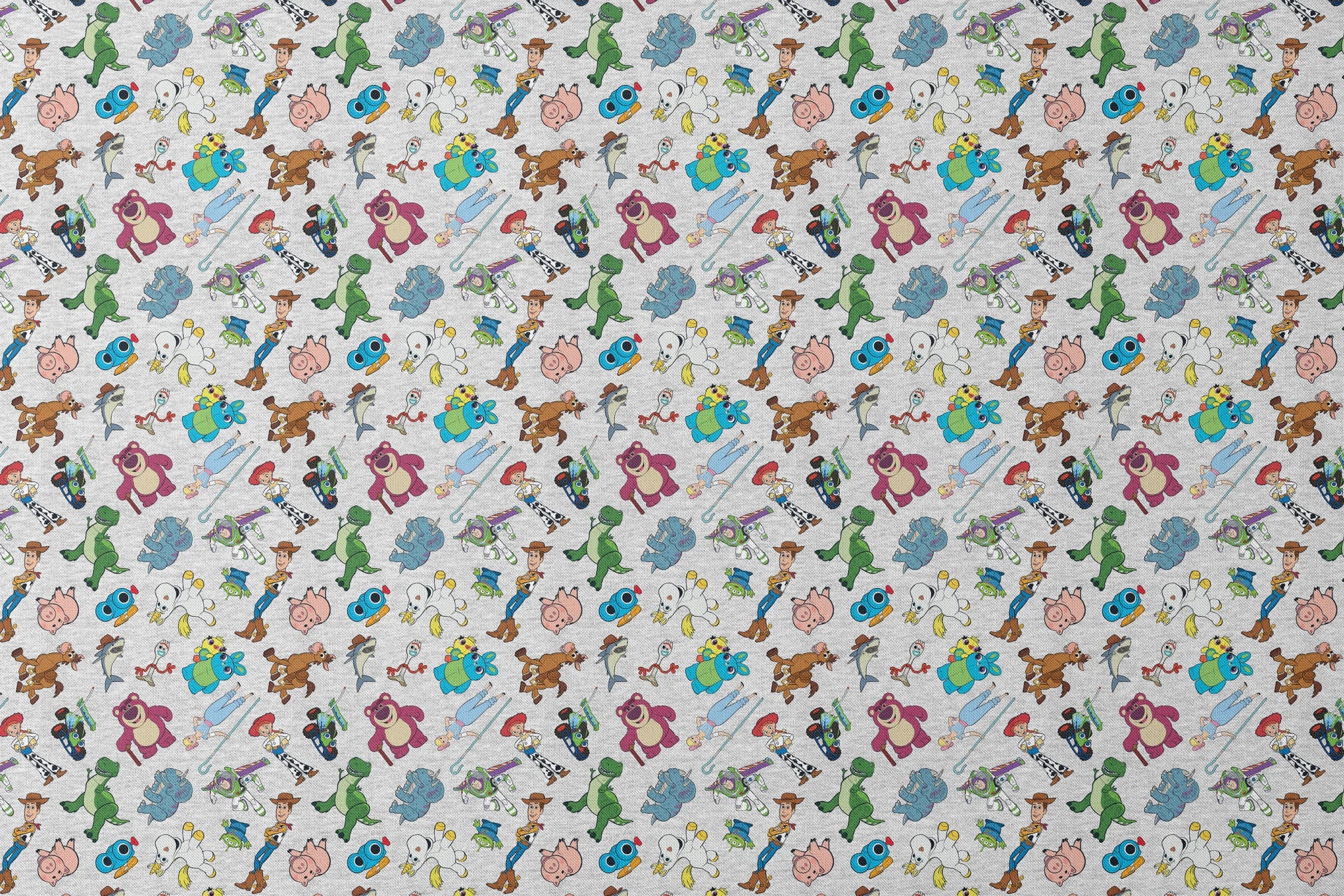 Colorful pattern of various animated Toy Story characters on a light speckled background designs flat mockup
