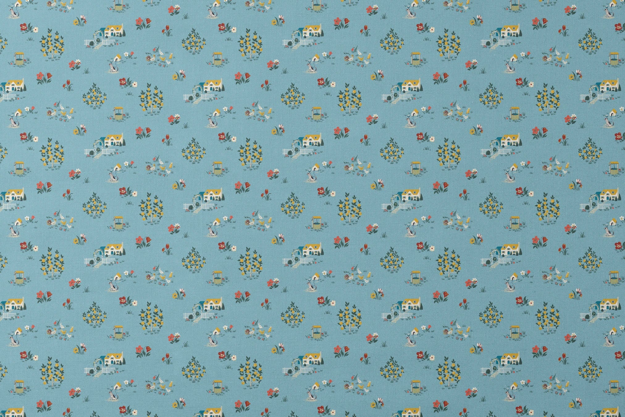 Blue-gray background with repeating folk art pattern of small cottages, white geese, floral clusters, and colorful tulips in yellow and red. designs flat mockup