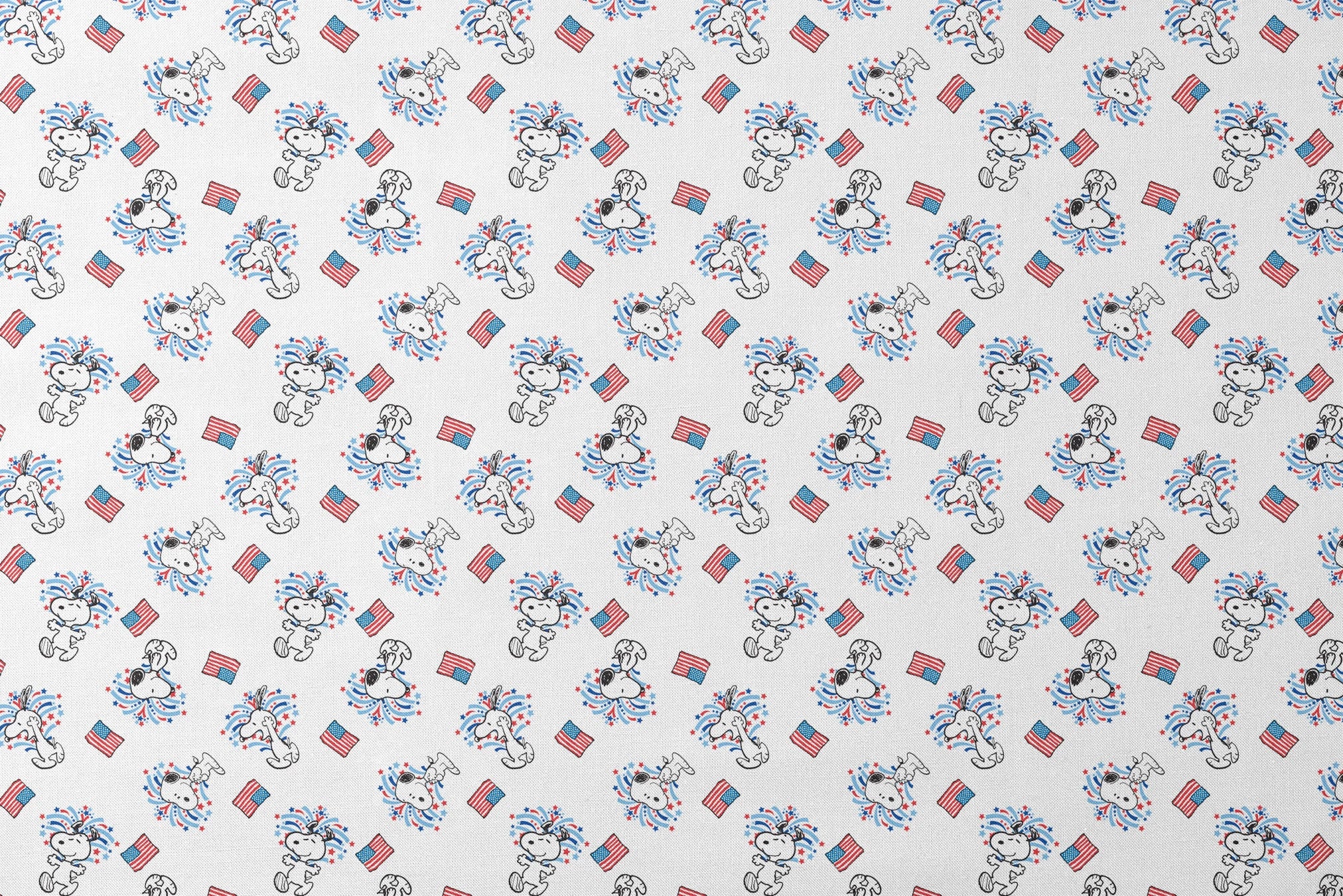 Snoopy with red and blue fireworks pattern alongside American flags on white background designs flat mockup