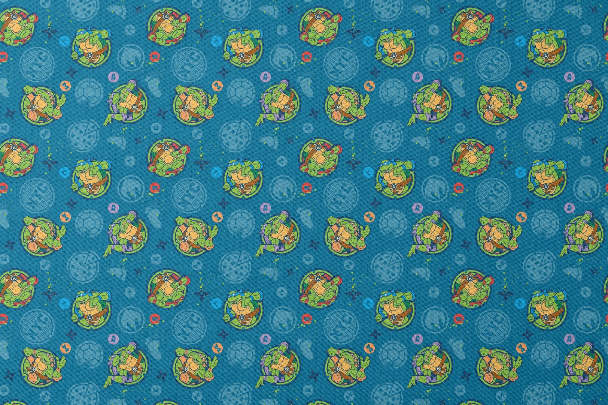 Teenage Mutant Ninja Turtles in circular medallions on teal background with subtle geometric patterns designs flat mockup