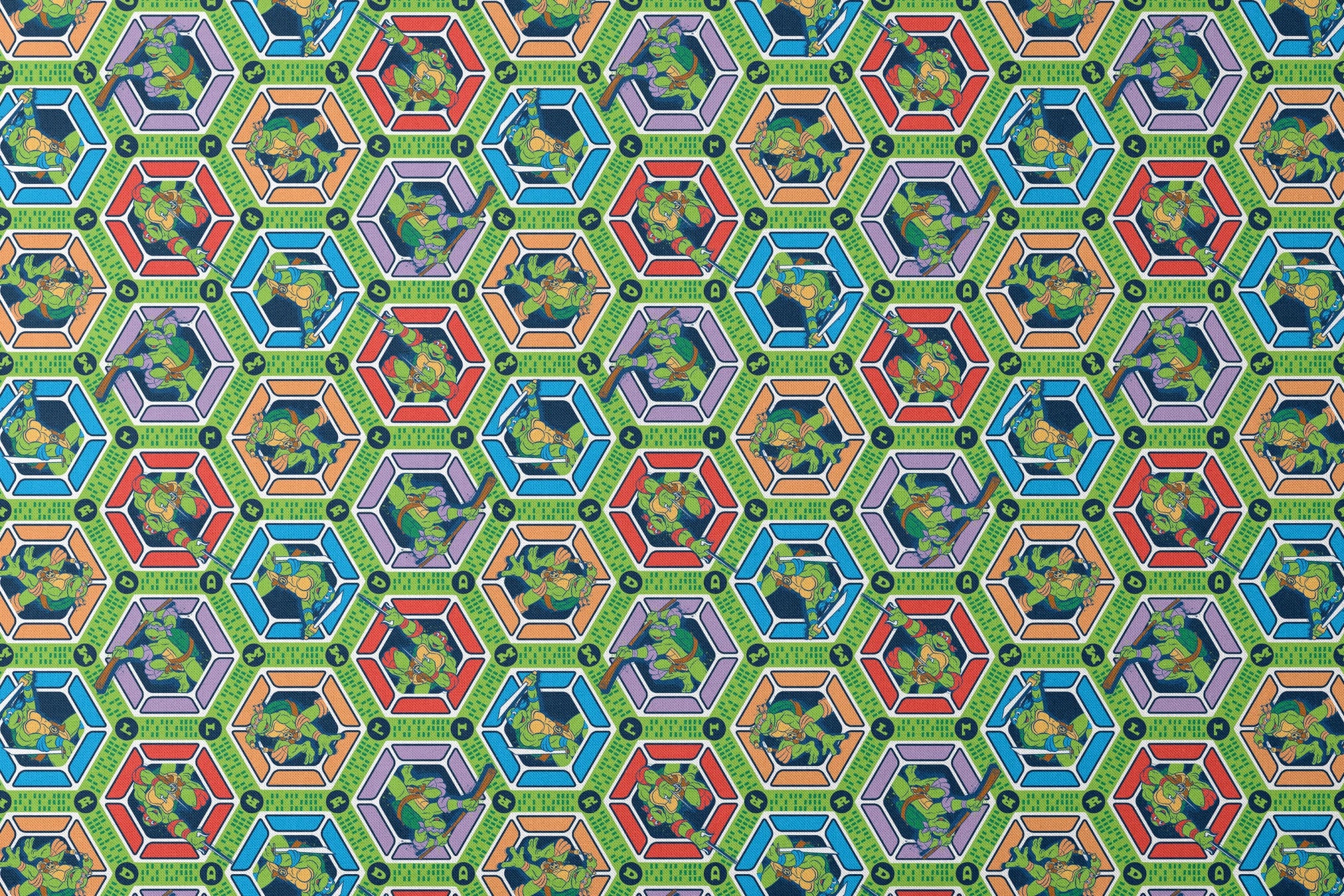 Colorful hexagonal pattern with Teenage Mutant Ninja Turtles and green text strips on blue background designs flat mockup