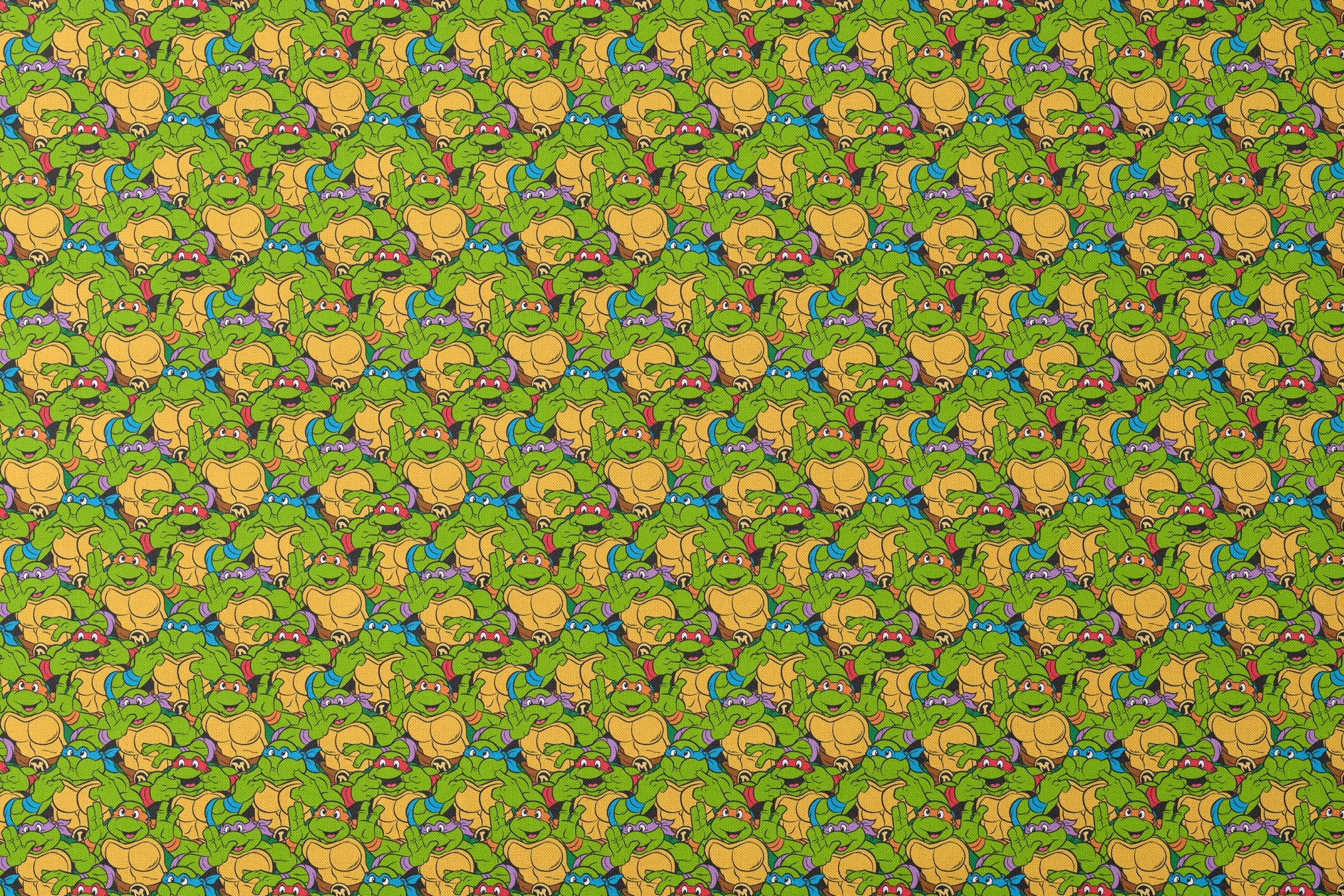 Colorful pattern of cartoon Teenage Mutant Ninja Turtles with green skin and yellow shells designs flat mockup