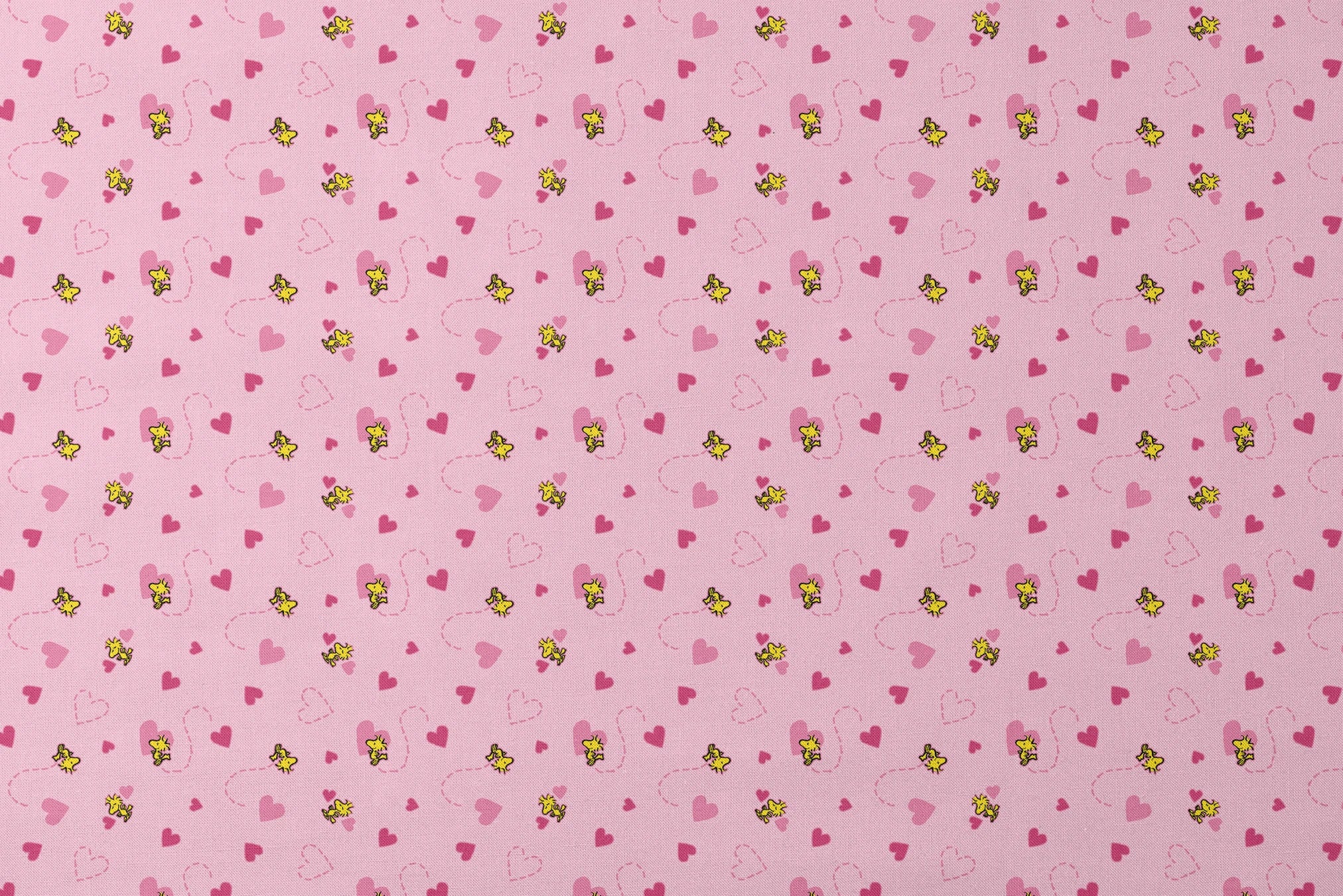 Pink background with hearts and Woodstock pattern, dotted heart outlines and solid pink hearts scattered throughout. designs flat mockup