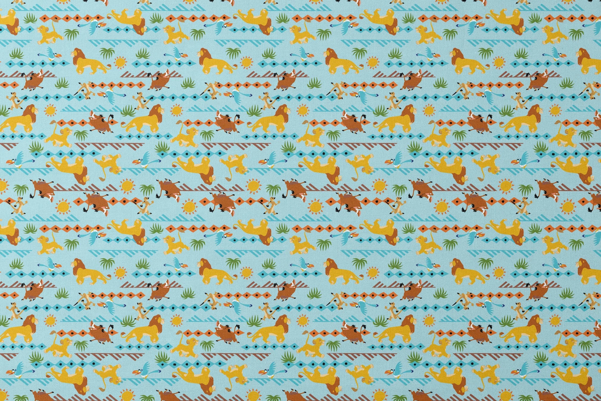 Colorful pattern with cartoon lions, palm trees, and sun designs on a light blue background designs flat mockup