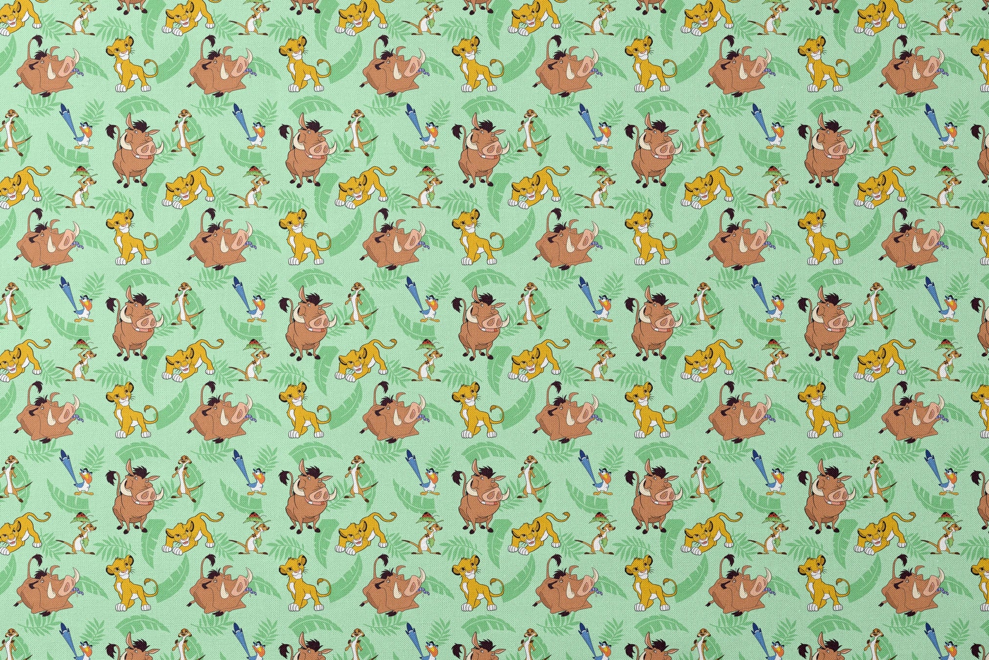 A repeating pattern of Lion King characters - Simba, Timon, Pumbaa, and Zazu on a light green leafy background. designs flat mockup