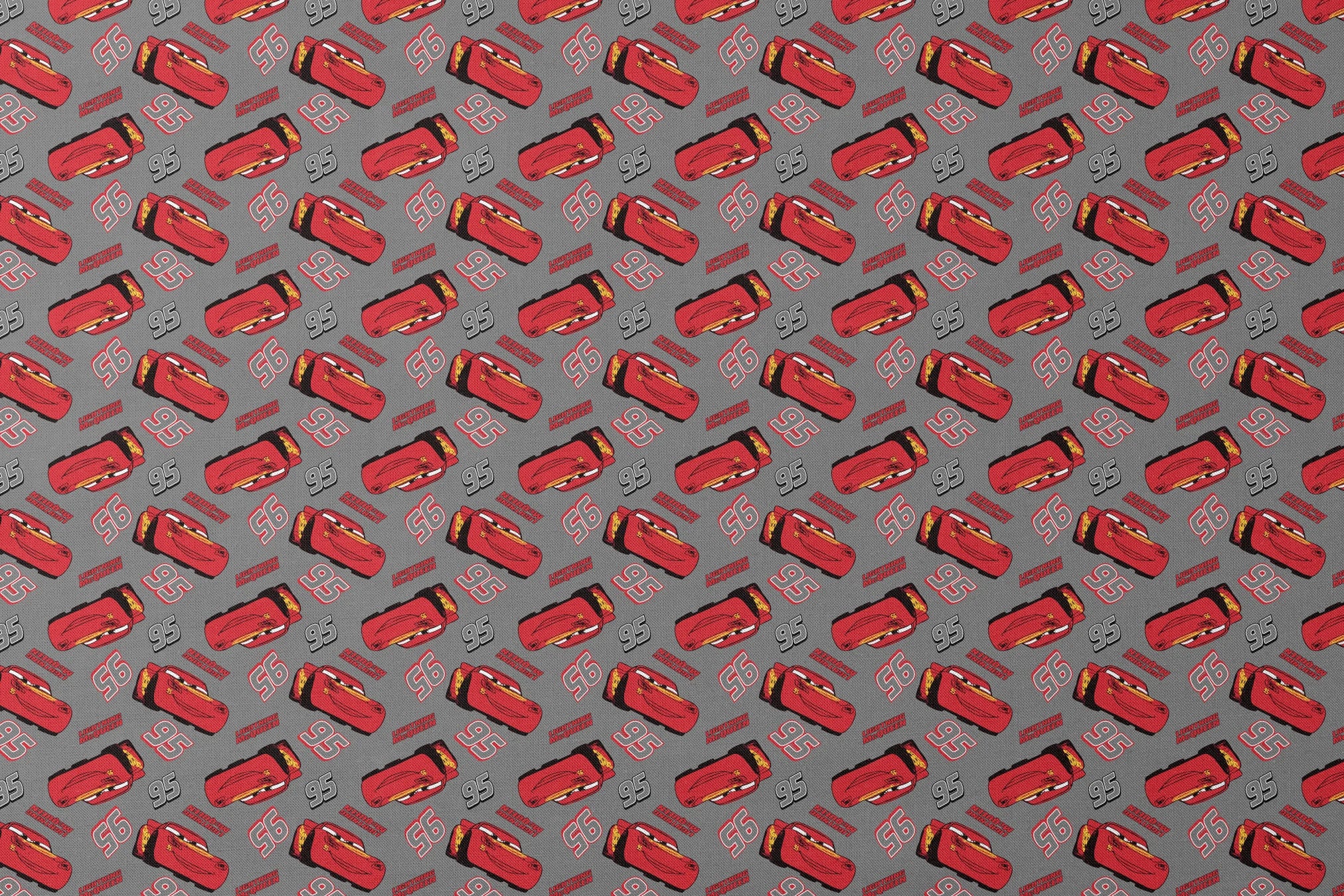 Lightning McQueen pattern with red race cars and number 95 on gray background designs flat mockup