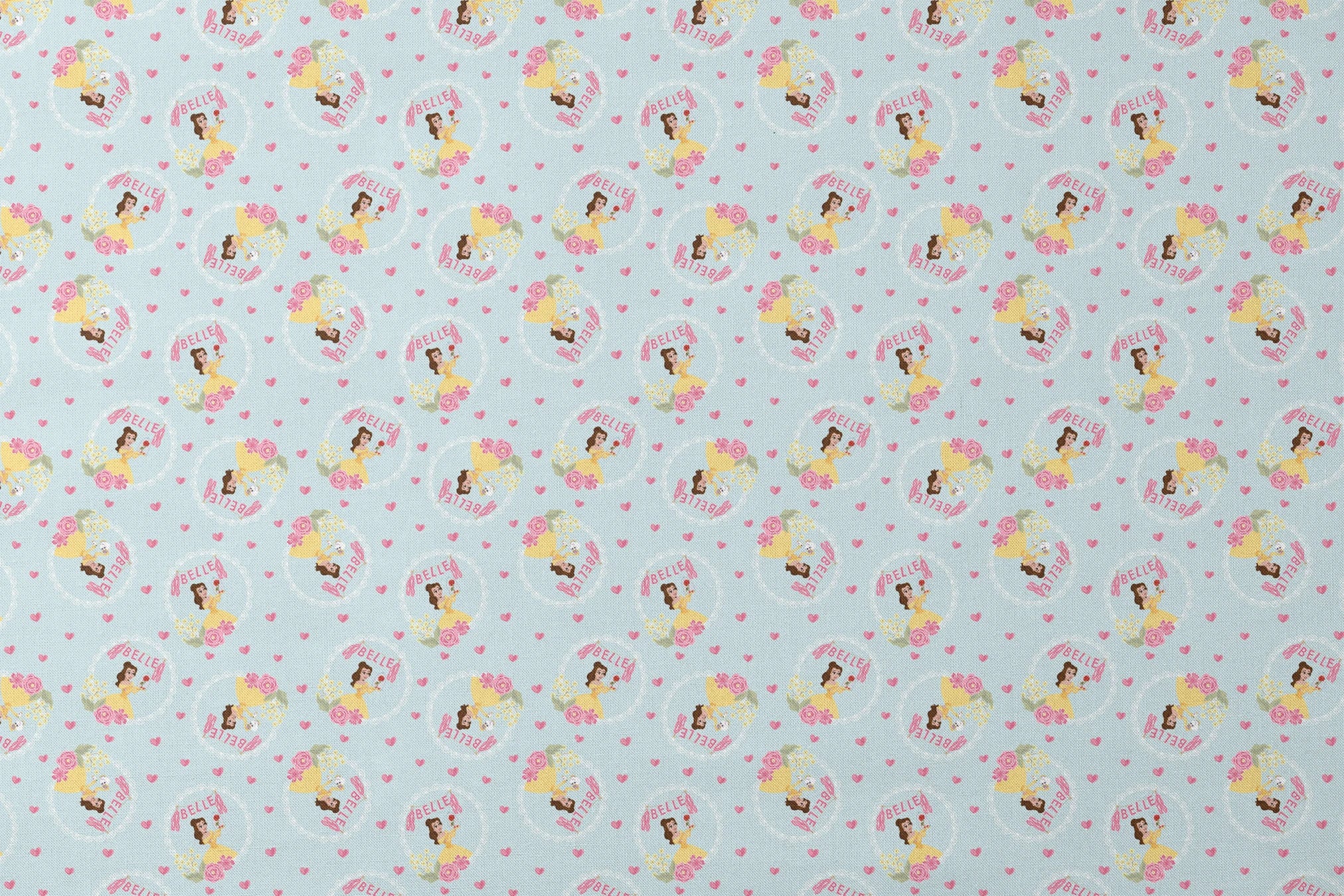 Princess Belle pattern with yellow dress, "Belle" text, hearts, and flowers on light blue background designs flat mockup