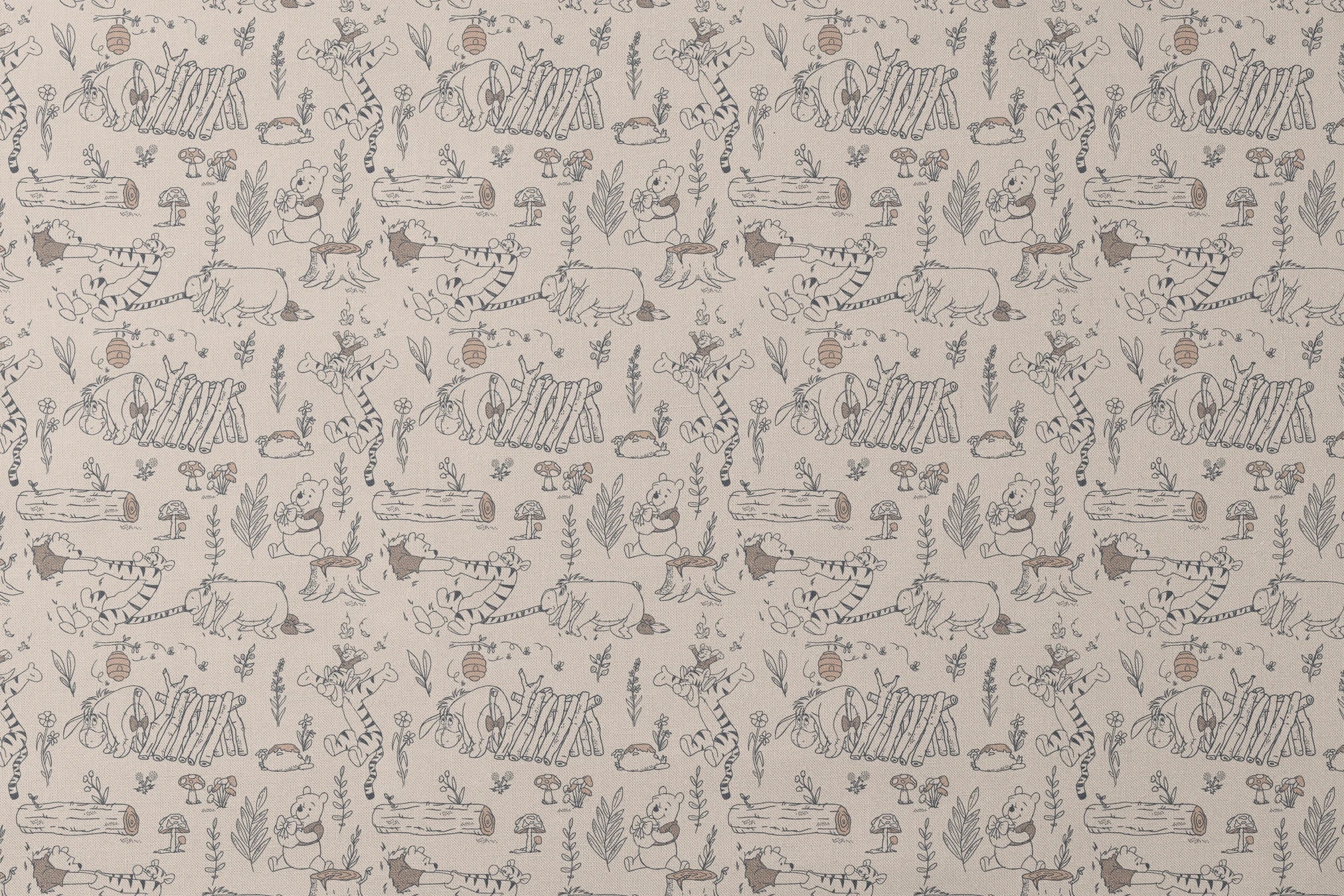Whimsical illustrated pattern of woodland animals, logs, and plants in black line art on beige background designs flat mockup