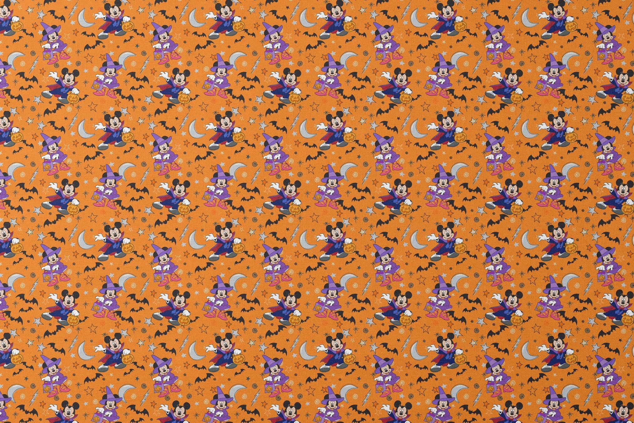 Halloween-themed cartoon pattern with Disney characters in costumes, bats, stars, moons, and ghosts on orange background. designs flat mockup