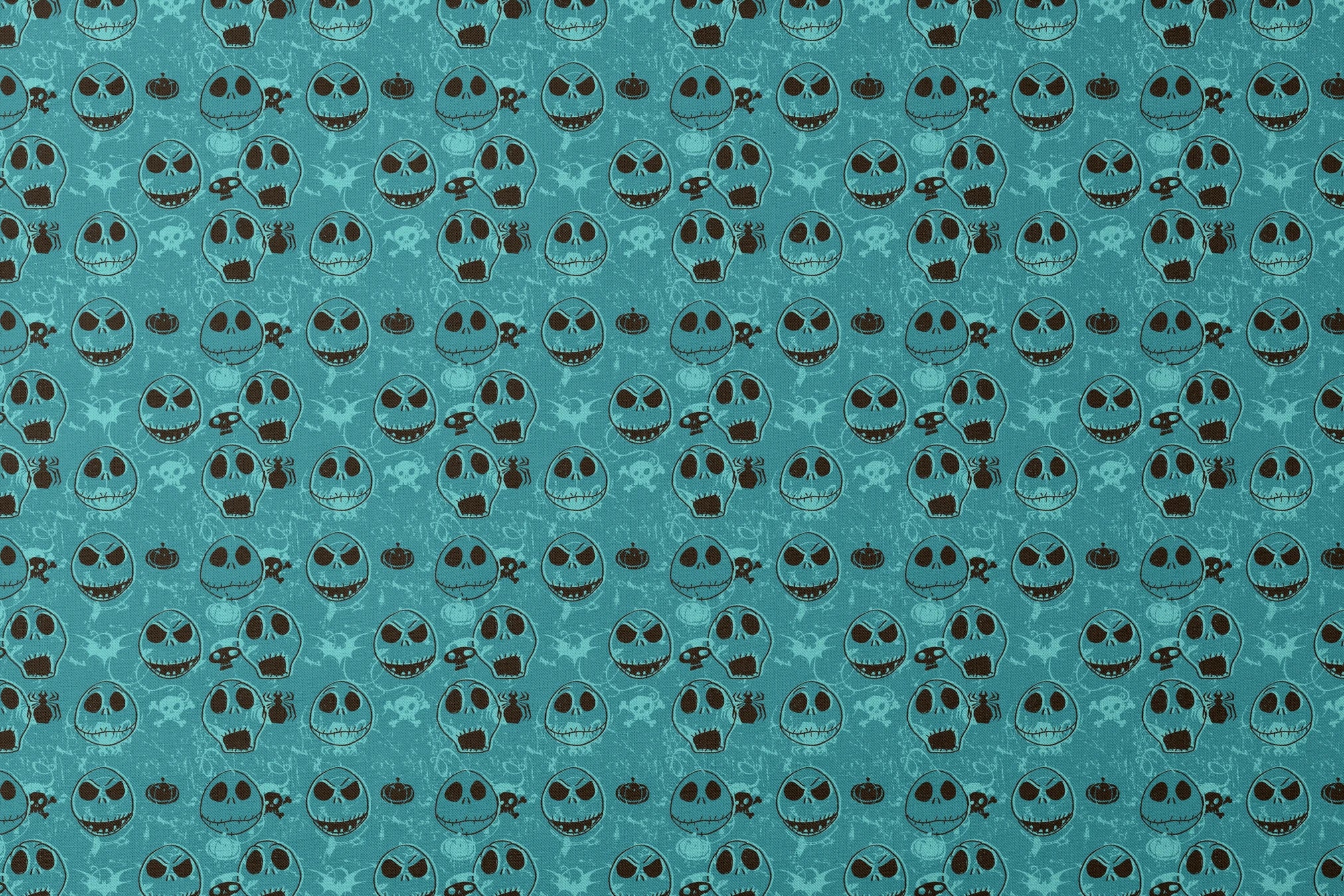 Teal pattern of cartoon skull faces with different expressions, Halloween elements like pumpkins and spiders designs flat mockup