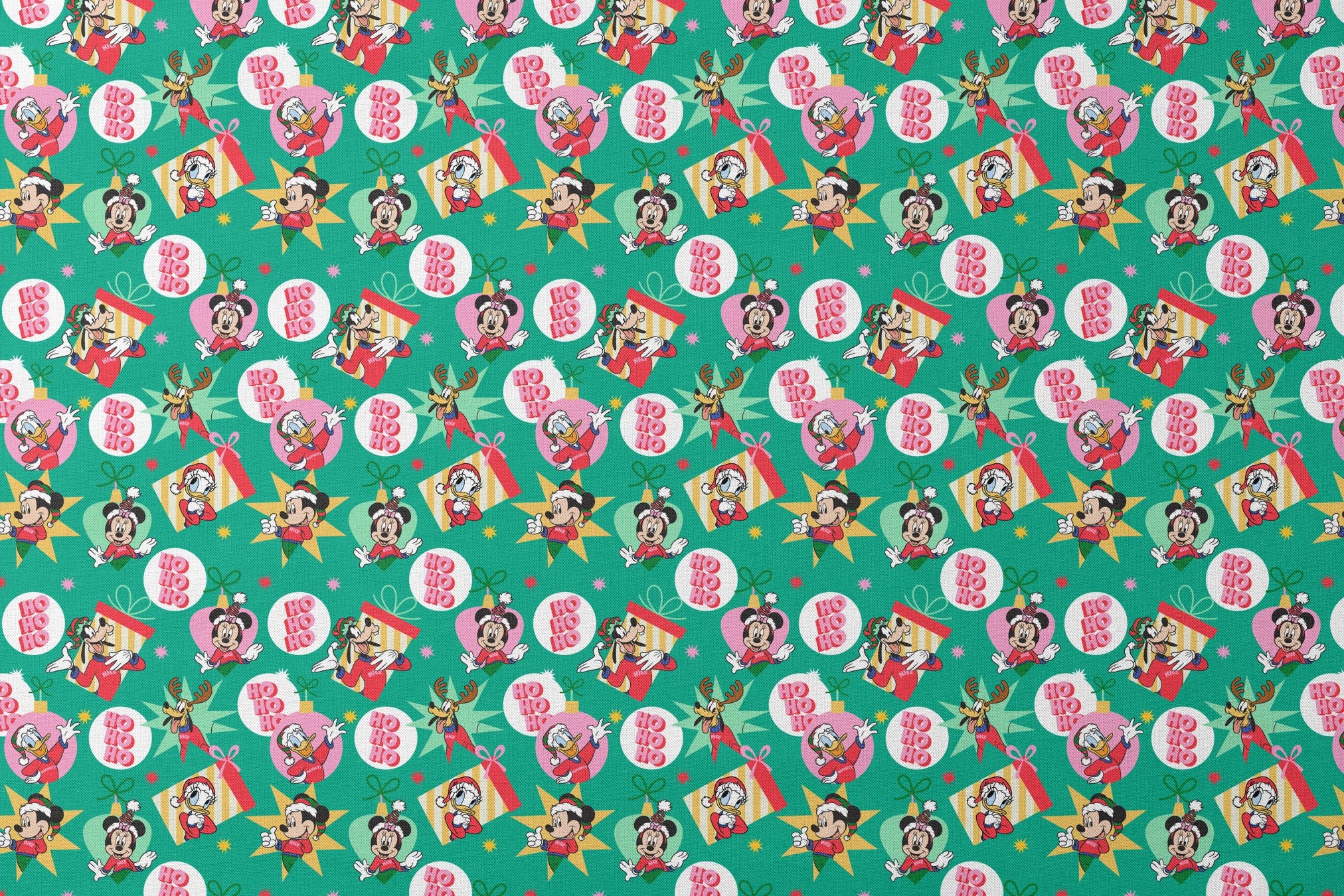 Festive Disney characters on green holiday pattern with "Ho Ho Ho" text and Christmas ornaments designs flat mockup