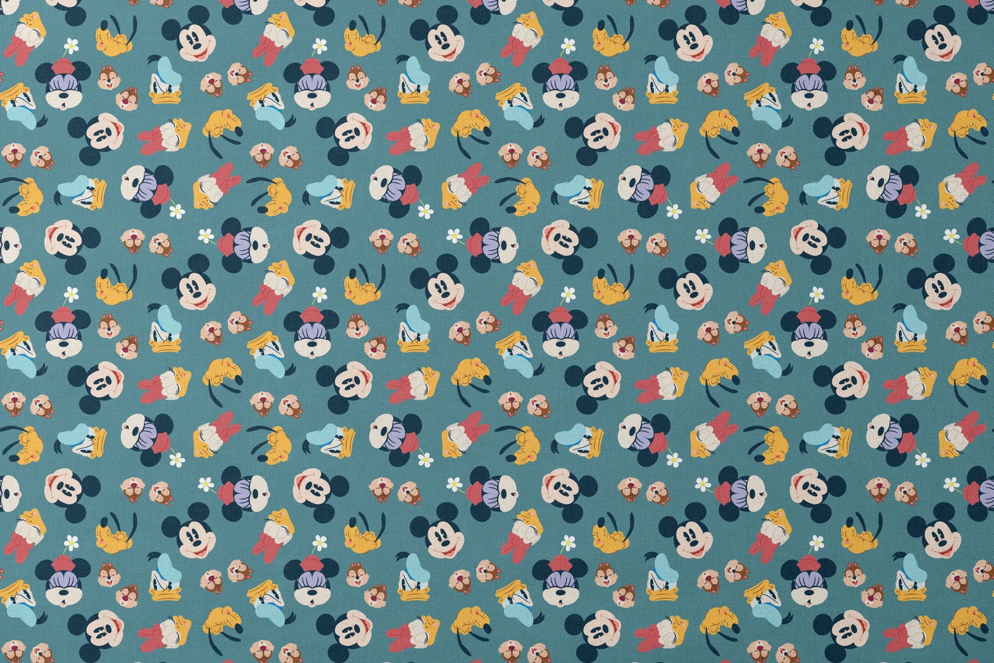 Disney cartoon characters pattern with Mickey Mouse, Donald Duck, and Pluto on teal background with small flowers designs flat mockup