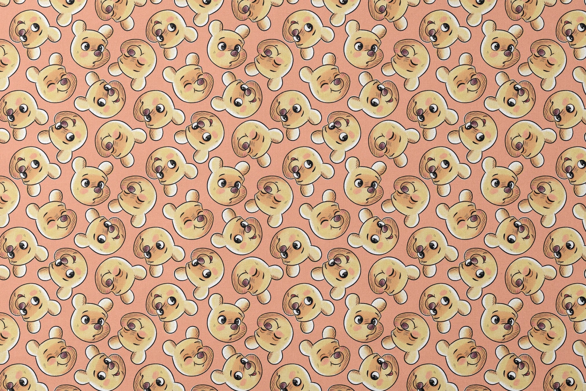 Cartoon teddy bear faces with cute expressions on peach background in repeating pattern designs flat mockup