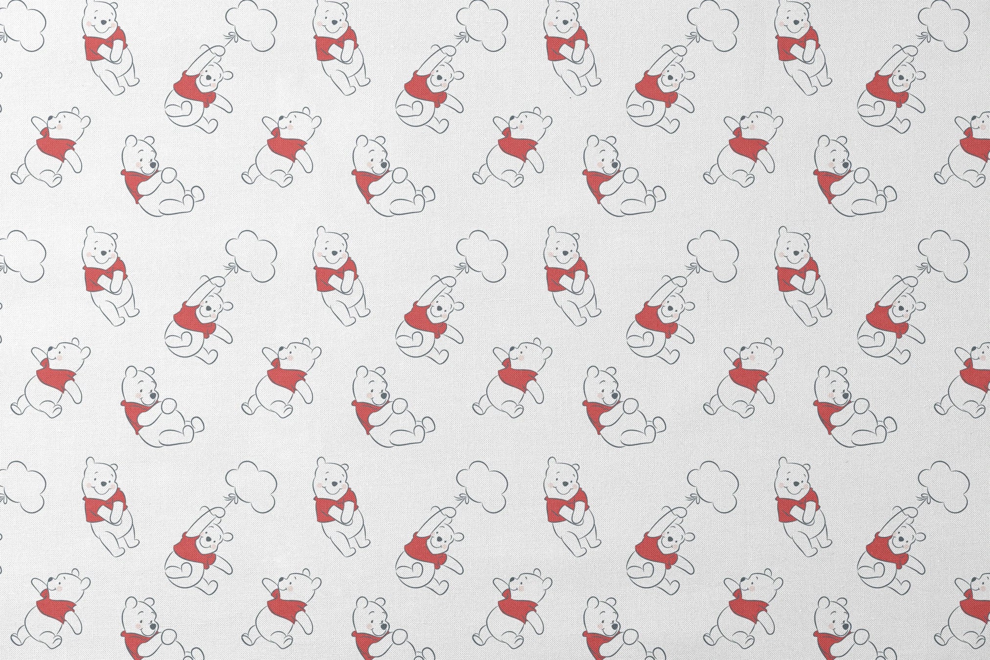 Illustration pattern of Winnie the Pooh in different poses wearing a red shirt on white background designs flat mockup