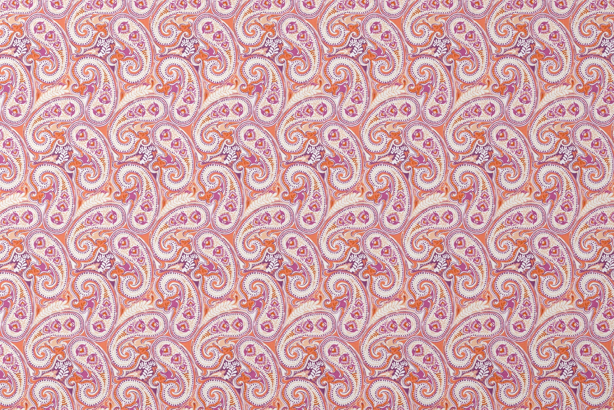 Vibrant paisley pattern in orange, pink and purple with swirling teardrop motifs and ornate details designs flat mockup