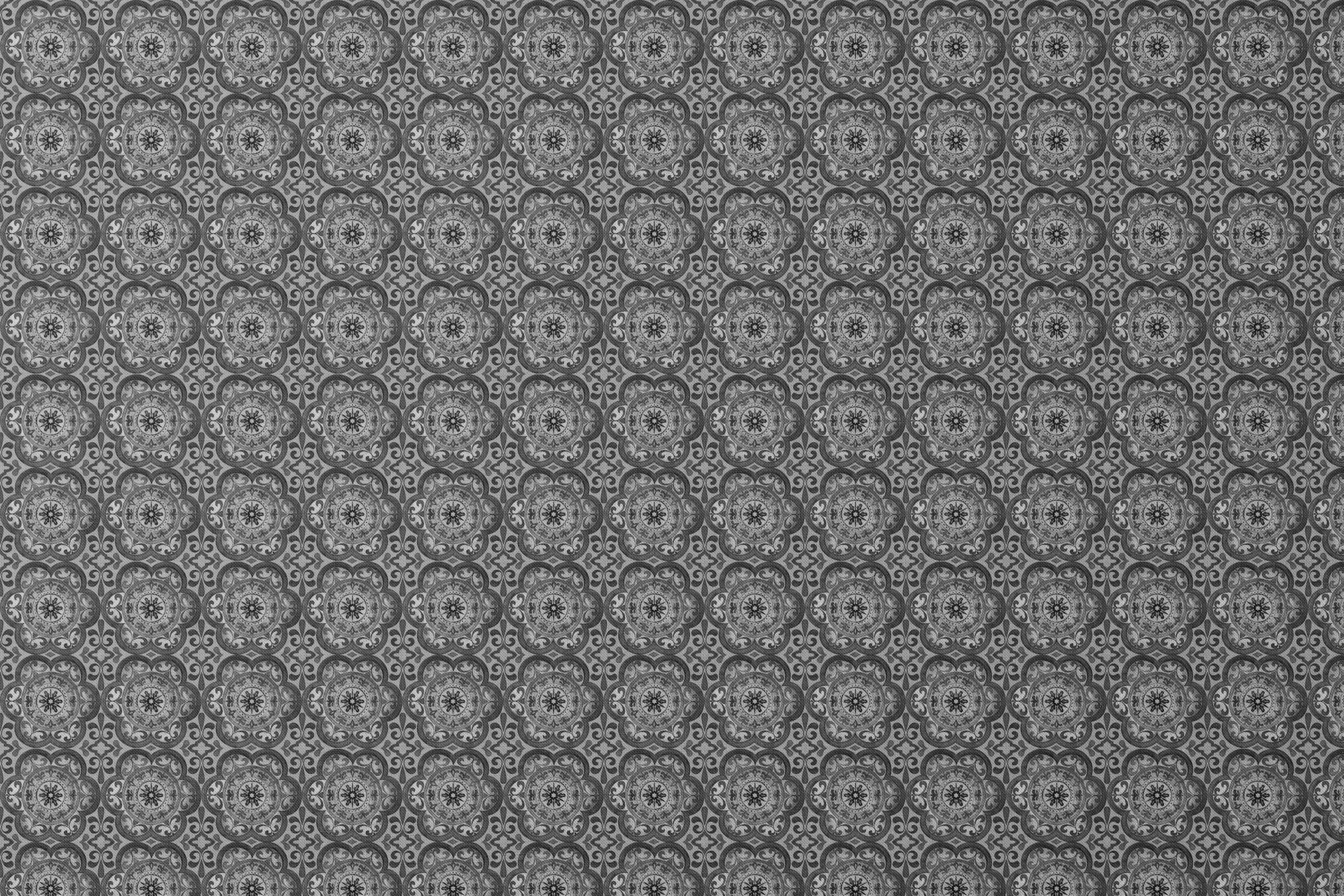 Grayscale medallion tile pattern with floral and scroll motifs in a symmetrical layout by Nicole Tamarin. designs flat mockup