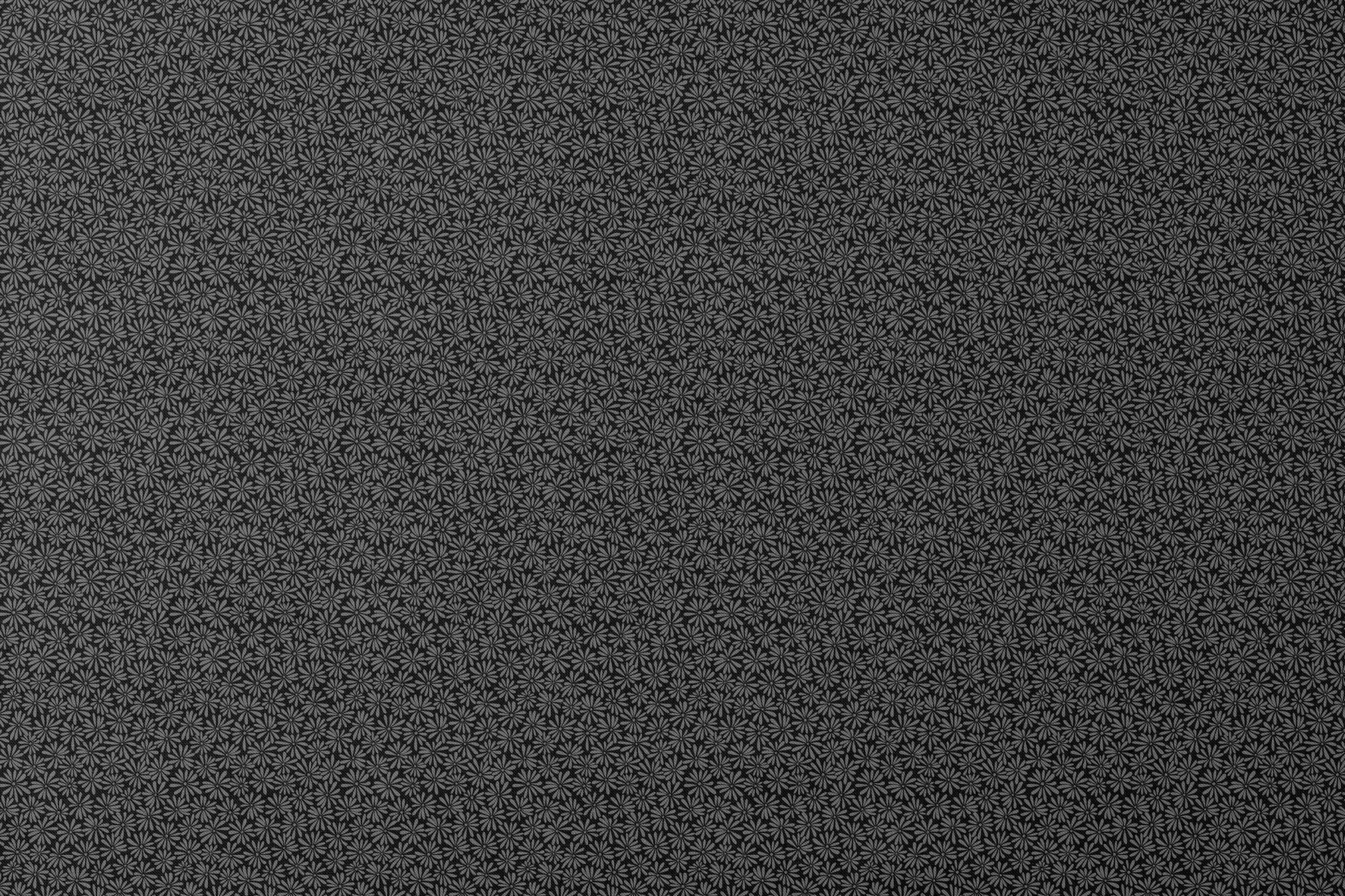 Tonal gray daisy ditsy floral fabric on a black background, designed by Nicole Tamarin – ideal for modern quilting and neutral sewing projects. designs flat mockup